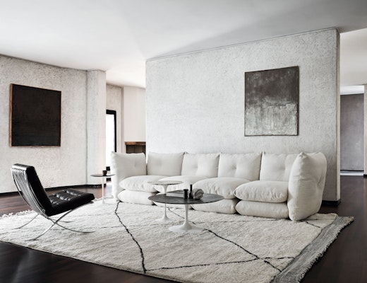 Perron Pillo Sofa, Barcelona Chair, and Saarinen Coffee Table Perron Pillo Sofa Saarinen Coffee Table Barcelona Chair