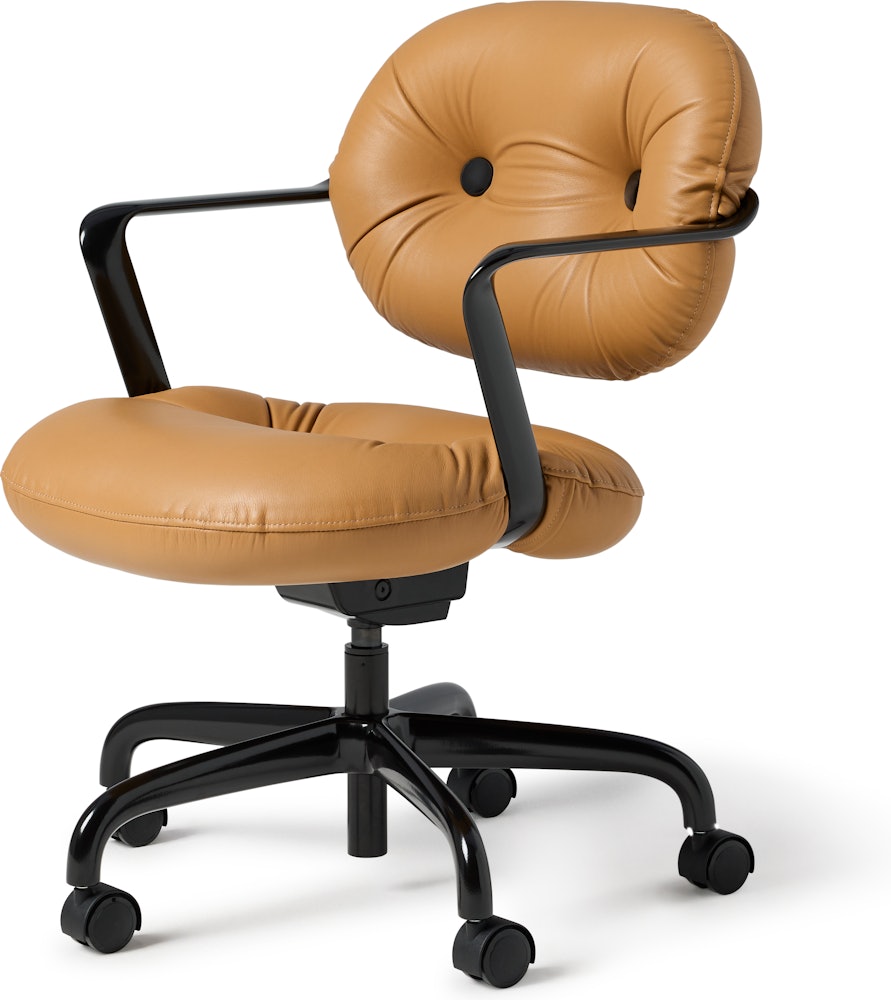 Front angle view of a Morrison Hannah chair with a black frame and base with fixed arms and light brown leather upholstery.