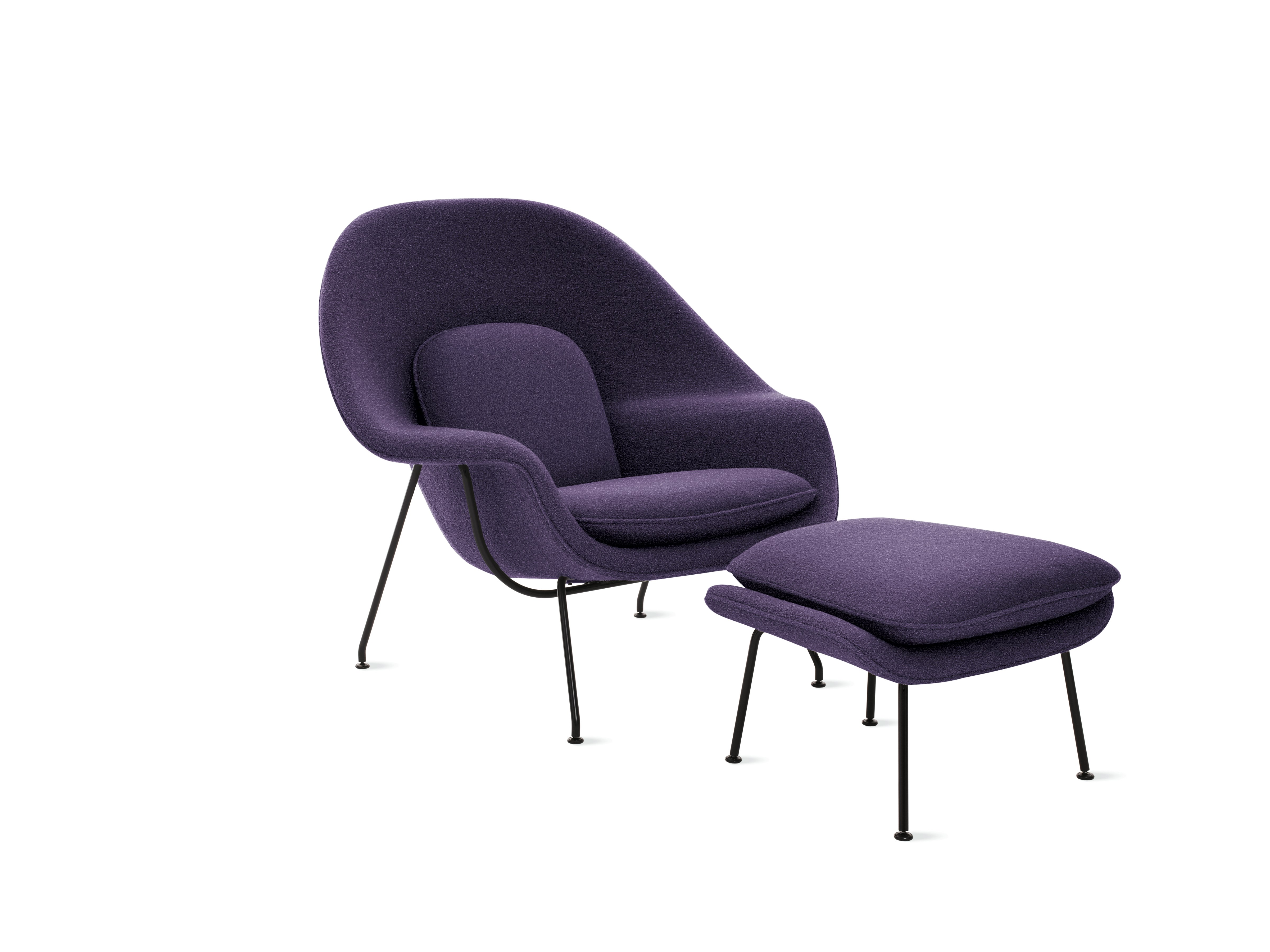 A black iris Womb Chair & Ottoman viewed from an angle.