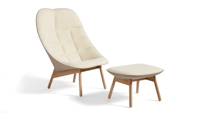 A front three quarter image of an Uchiwa Lounge Chair and Ottoman by Hay