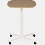Large Passport Work Table with light woodgrain surface and white base shown on casters.