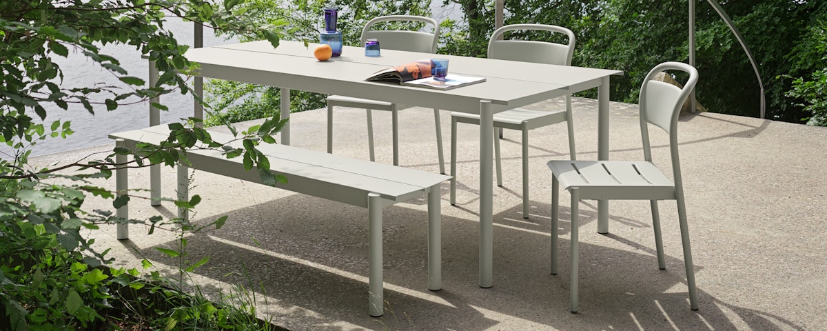 Linear Steel Bench, Table and Chair in an outdoor setting