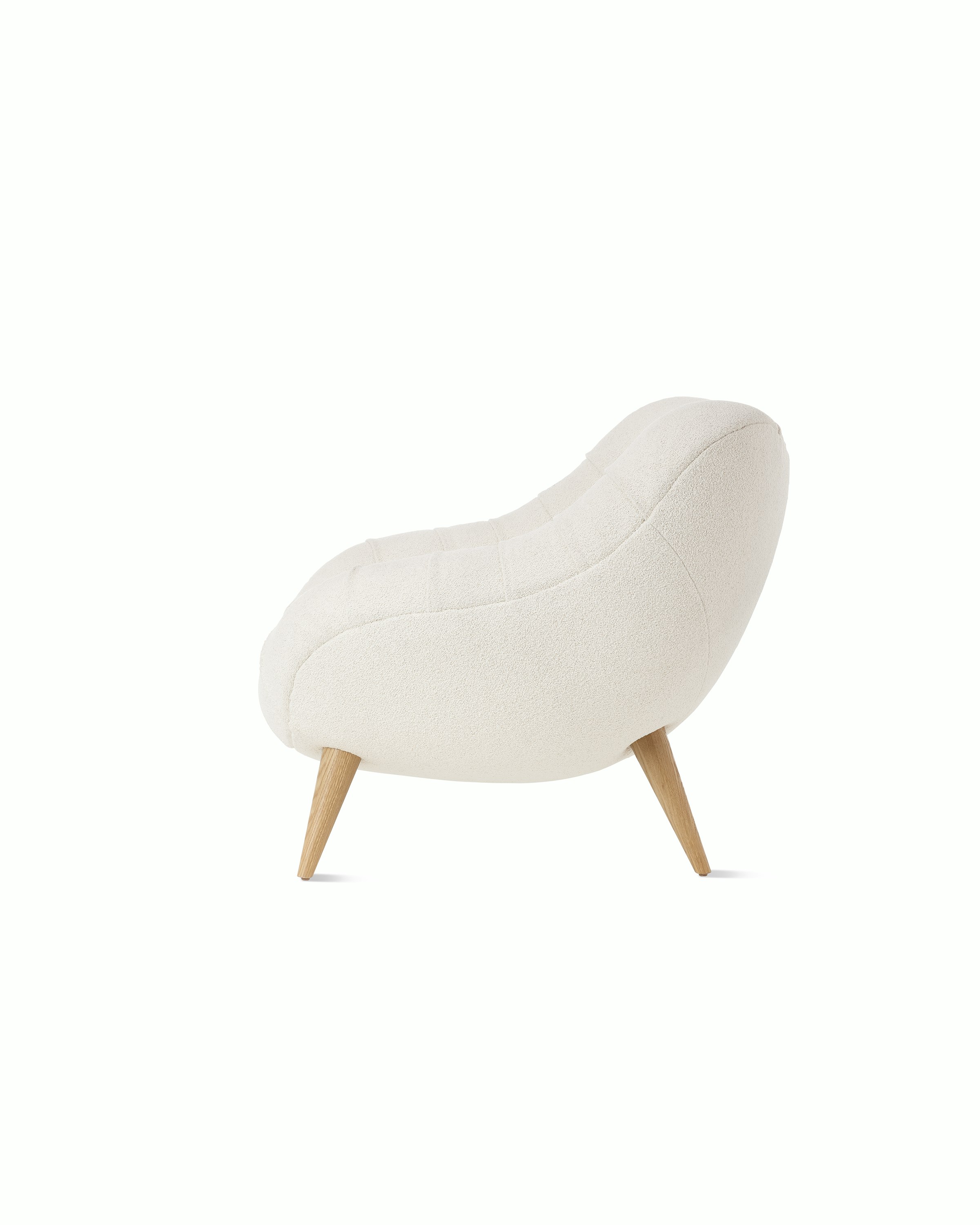 Rohde Easy Chair in ivory side view.