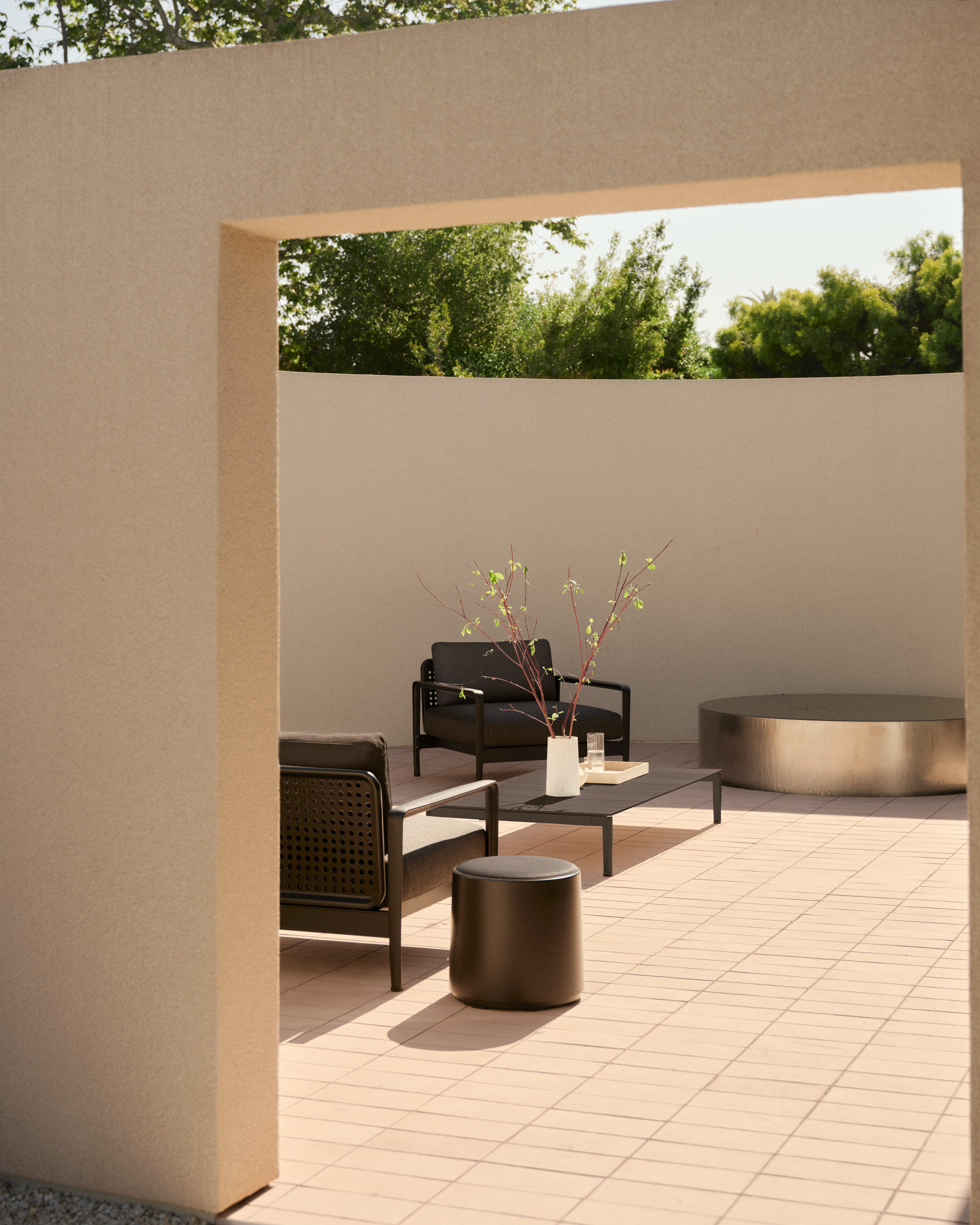 Lissoni Outdoor Lounge Chair, Coffee Table and stools in black and white