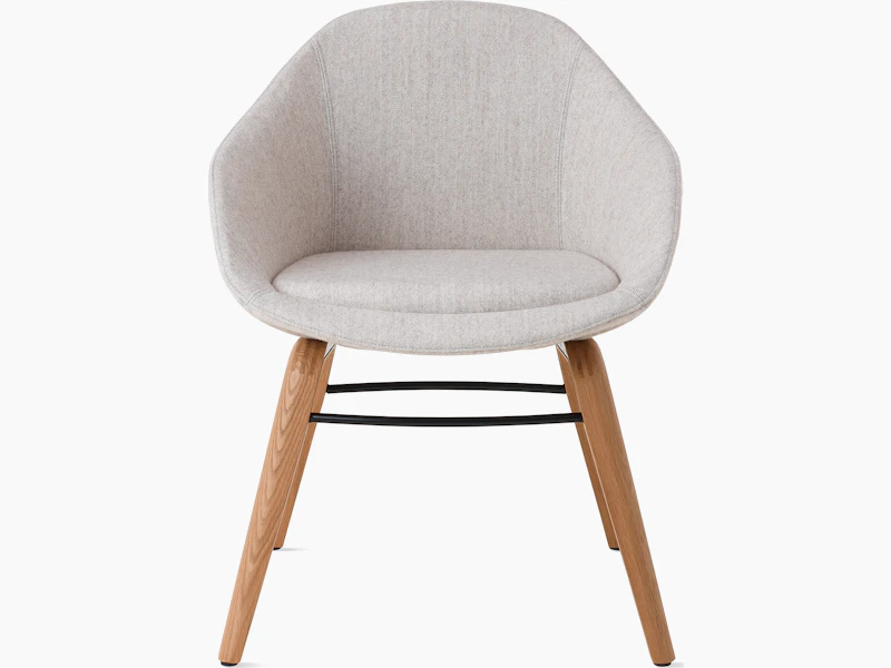 White background shot of Always Chair with grey fabric and wooden legs.