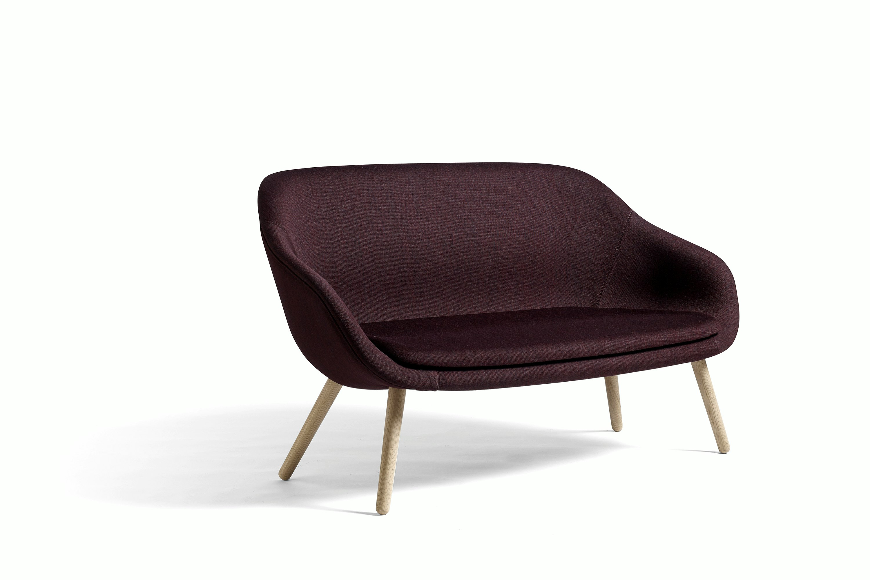 A maroon About A Lounge Sofa.