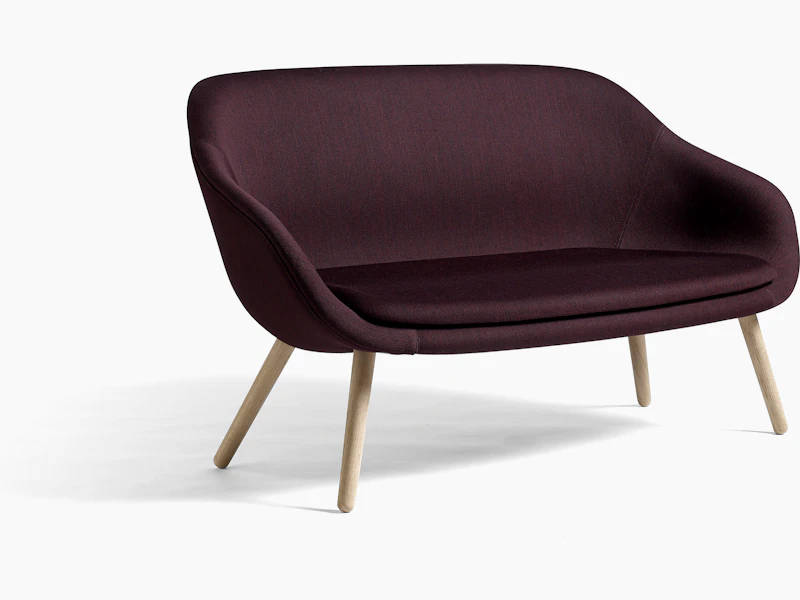 A maroon About A Lounge Sofa.