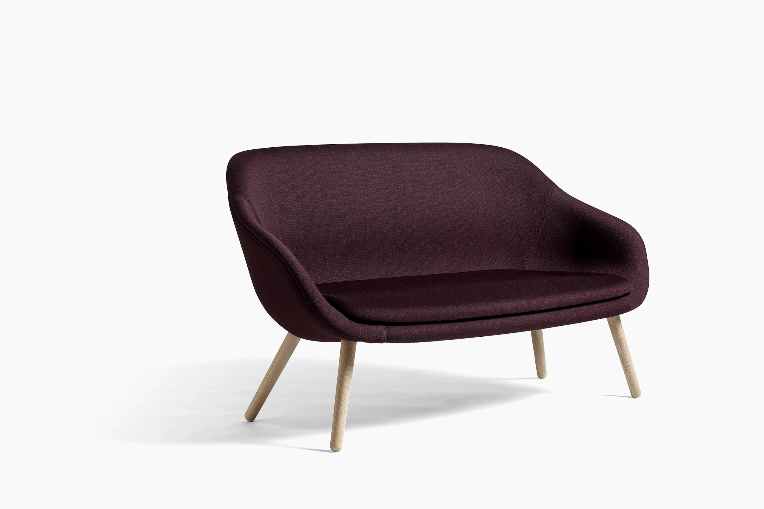 A maroon About A Lounge Sofa.