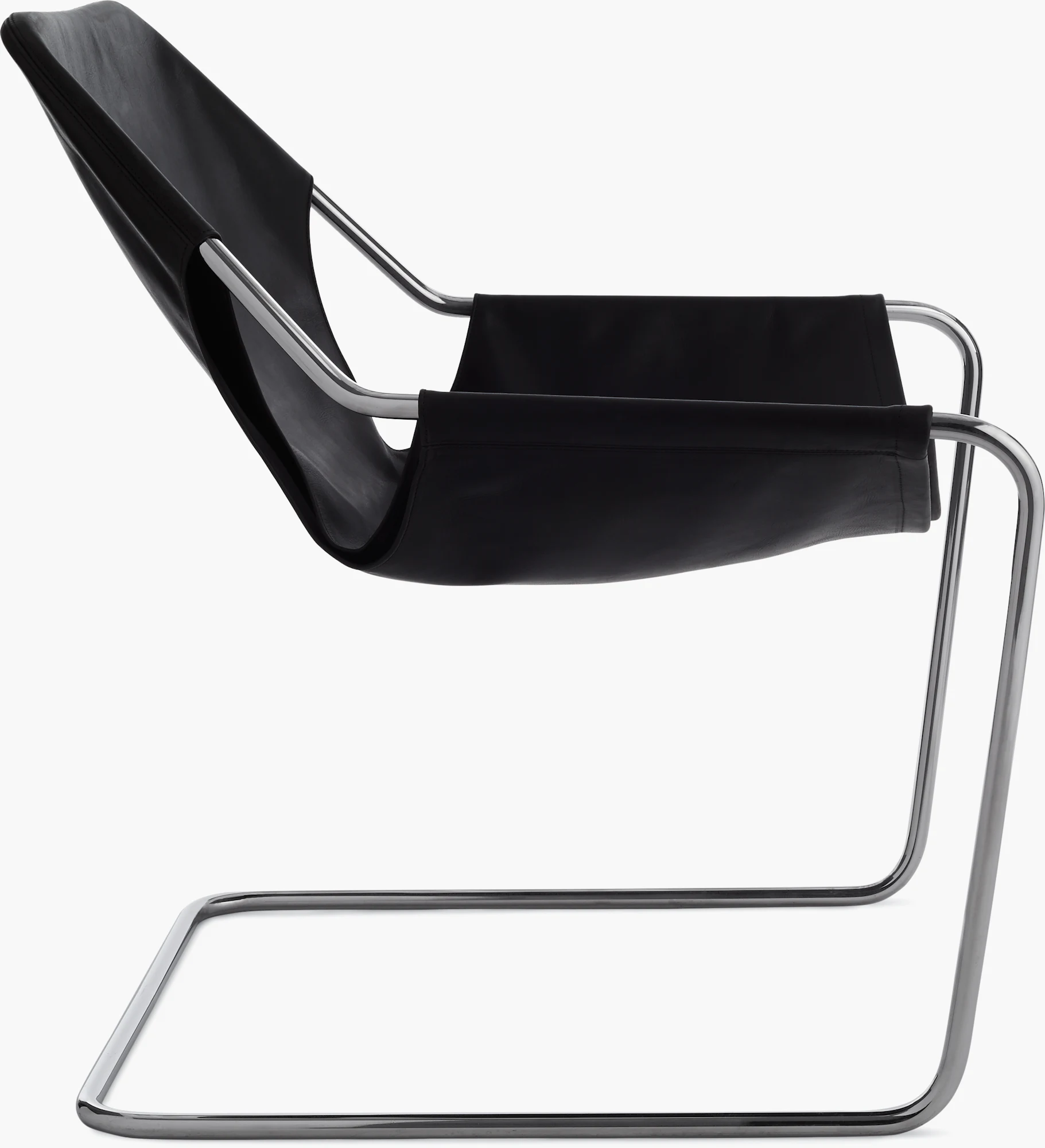 Paulistano armchair side view with black upholstery and chrome frame