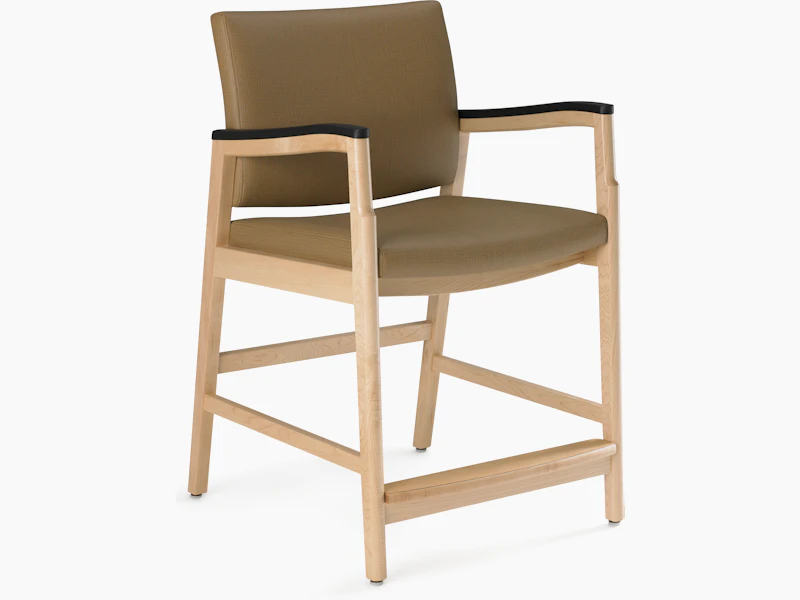 A Monarch Patient Chair (easy access model) with solid hardwood frame and urethane arm caps.