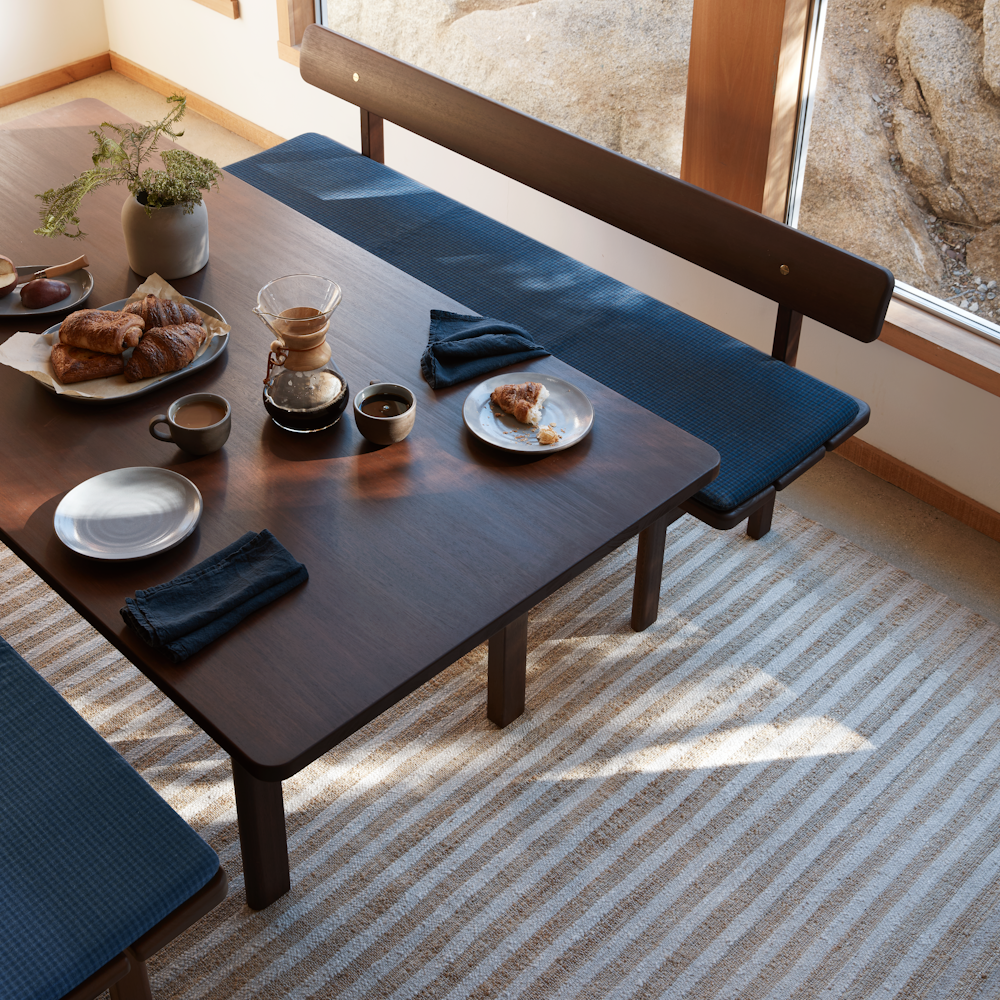 Asserbo Dining Table and Asserbo Dining Bench with breakfast items