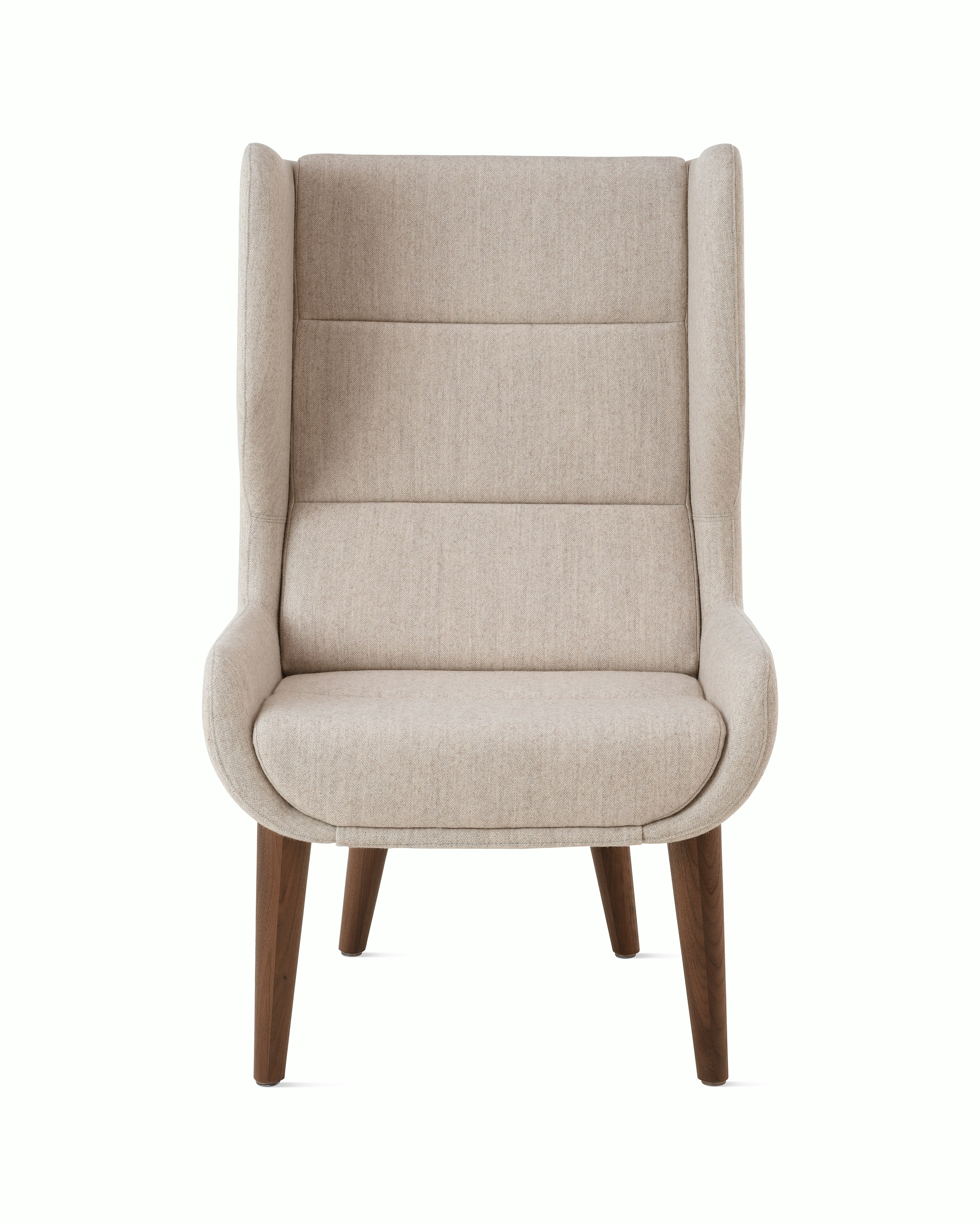 White sweep of Hush chair with cream fabric and walnut base