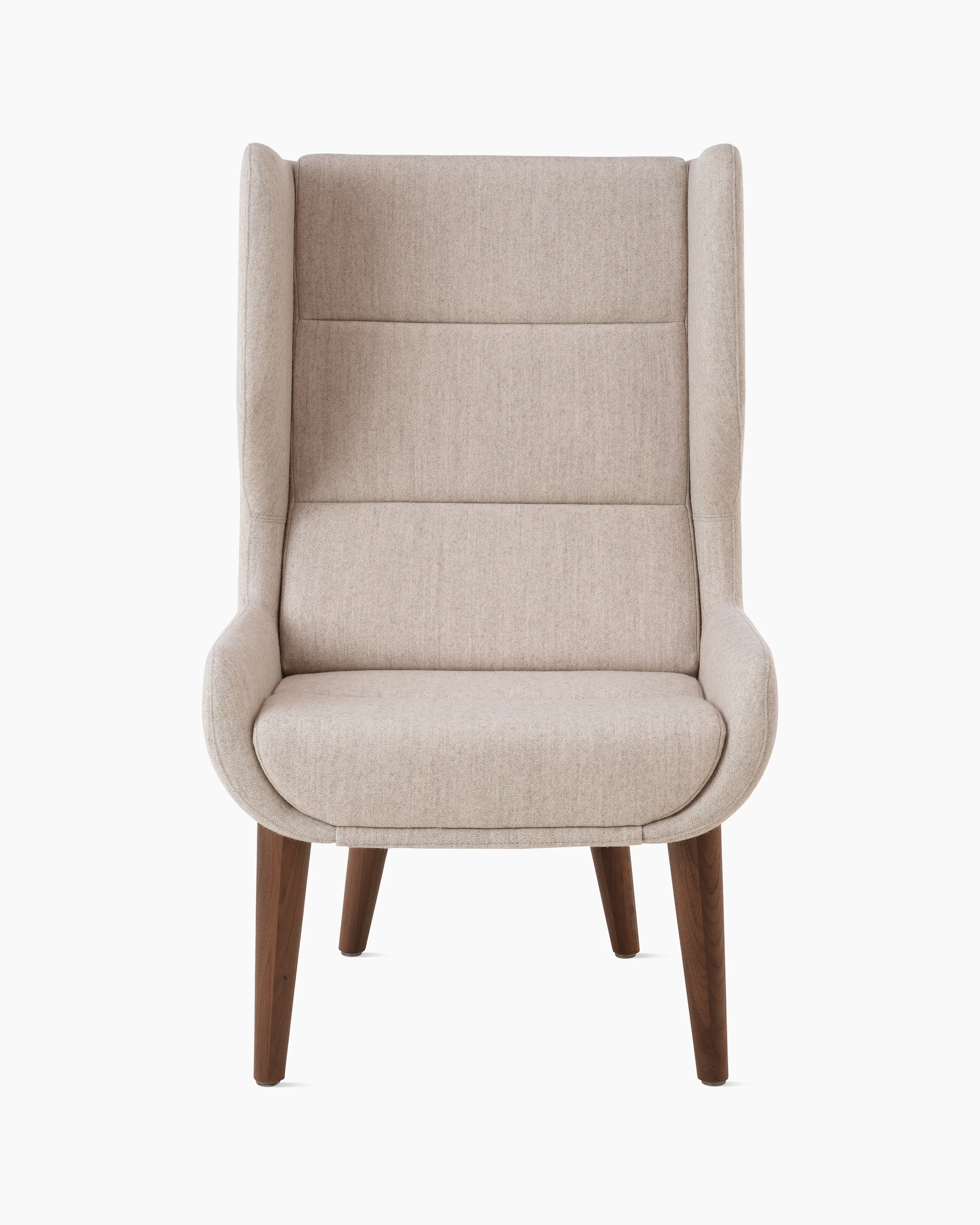 White sweep of Hush chair with cream fabric and walnut base