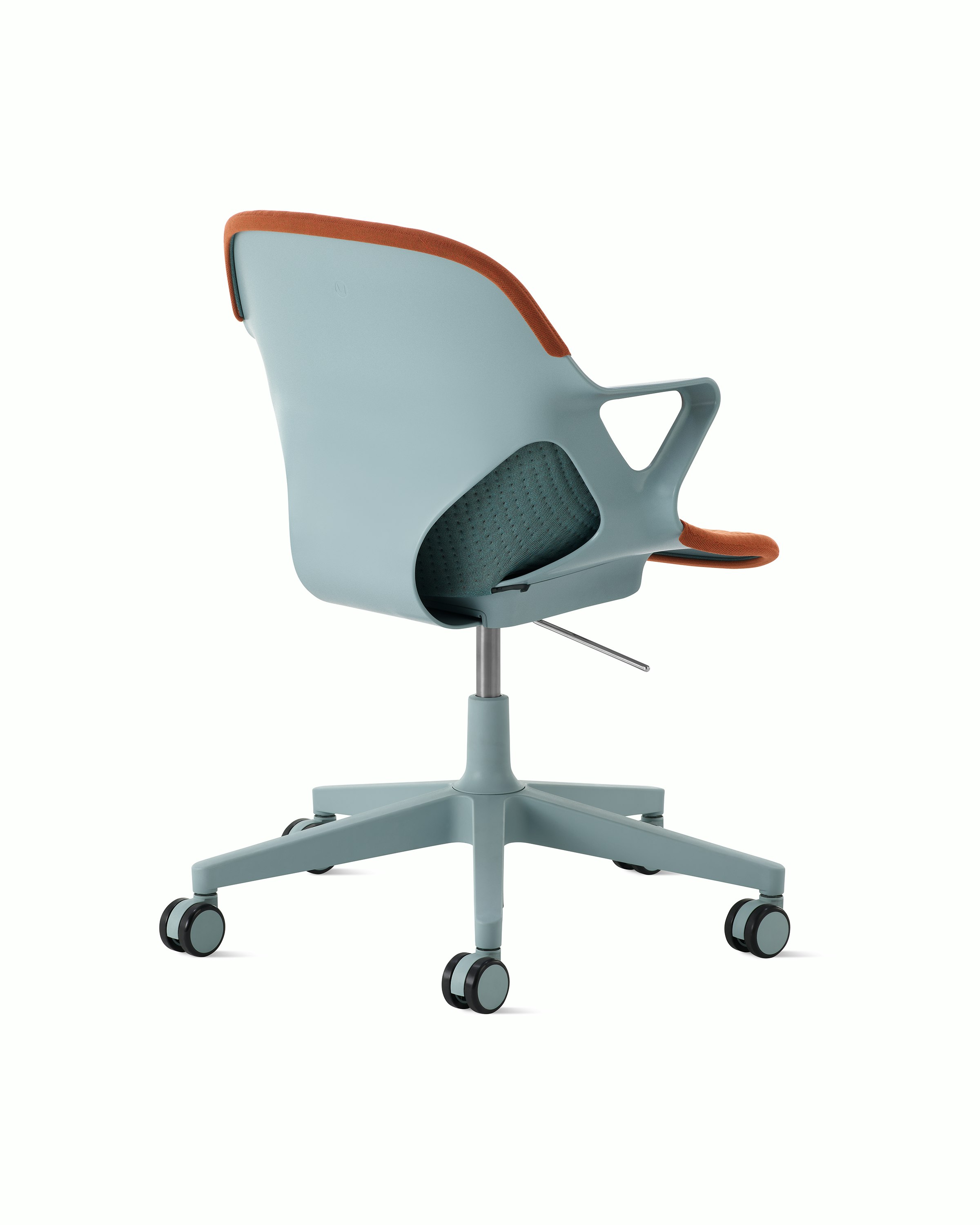 Angle view of Zeph Chair in Glacier with two-toned glacier/cayenne unibody