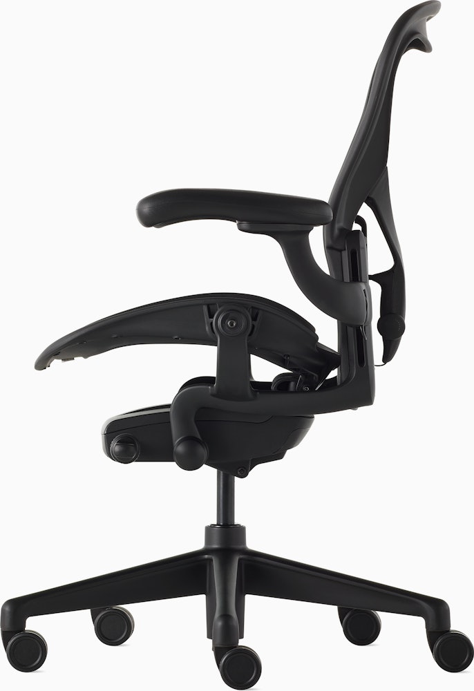 Black matte Aeron Chair on a white background with a 5-star base and ergonomic back support, viewed from the side.