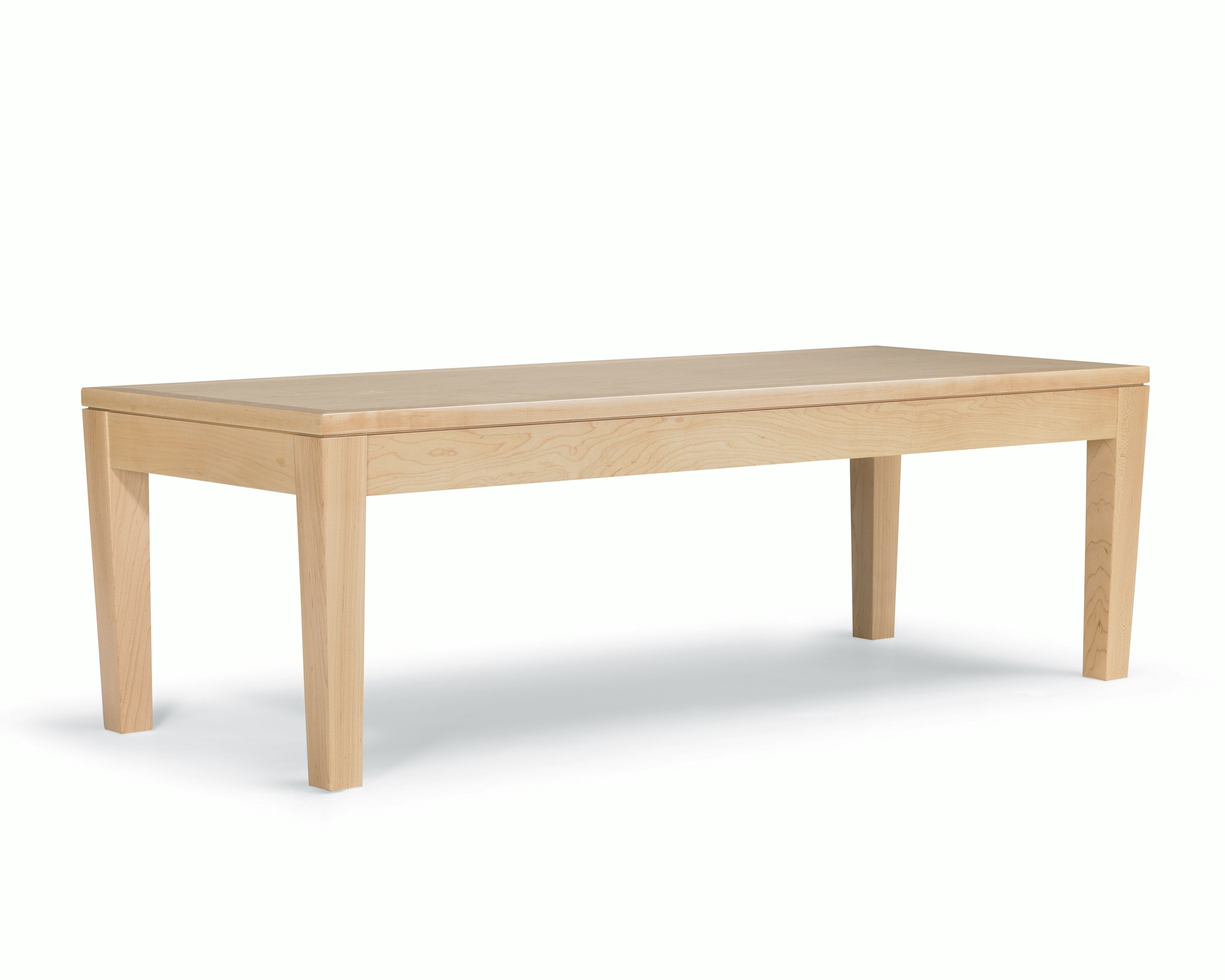A Brava Table in solid maple with a light finish.