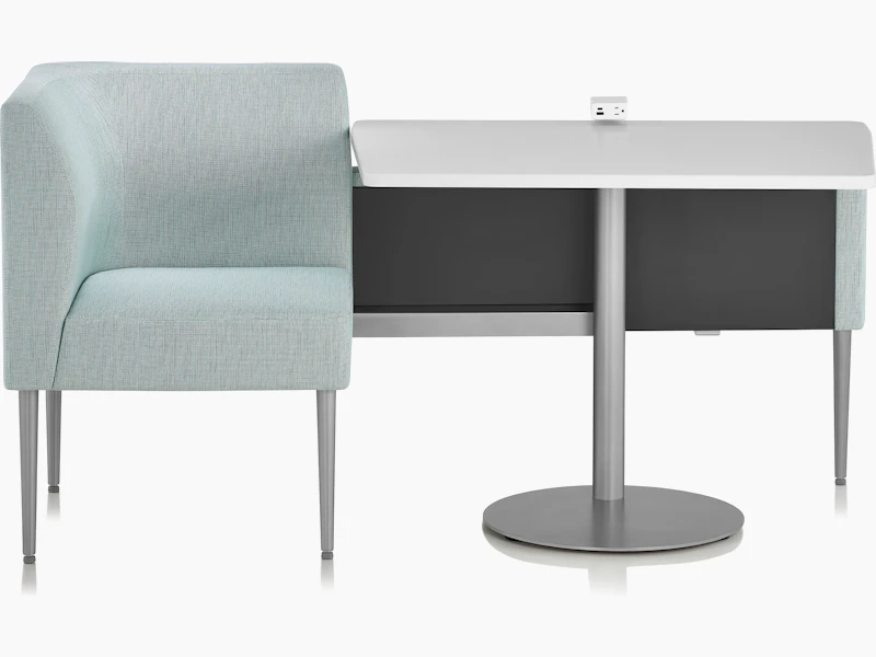 Nemschoff Palisade Booth configuration of a single booth in a light green upholstery with a center table with a white surface and Logic power access unit on it.