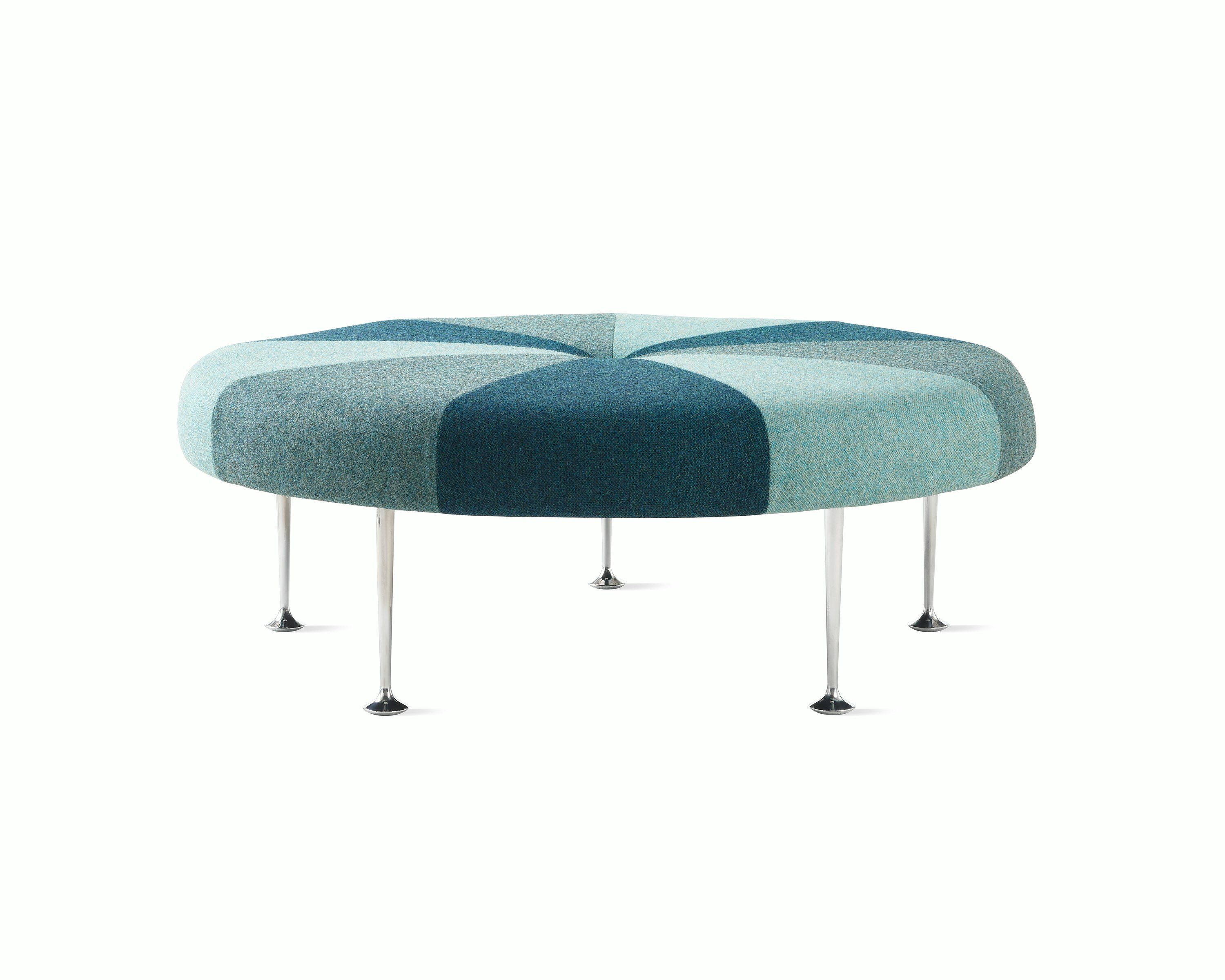 A Girard Color Wheel Ottoman upholstered in green fabrics, viewed from the side.
