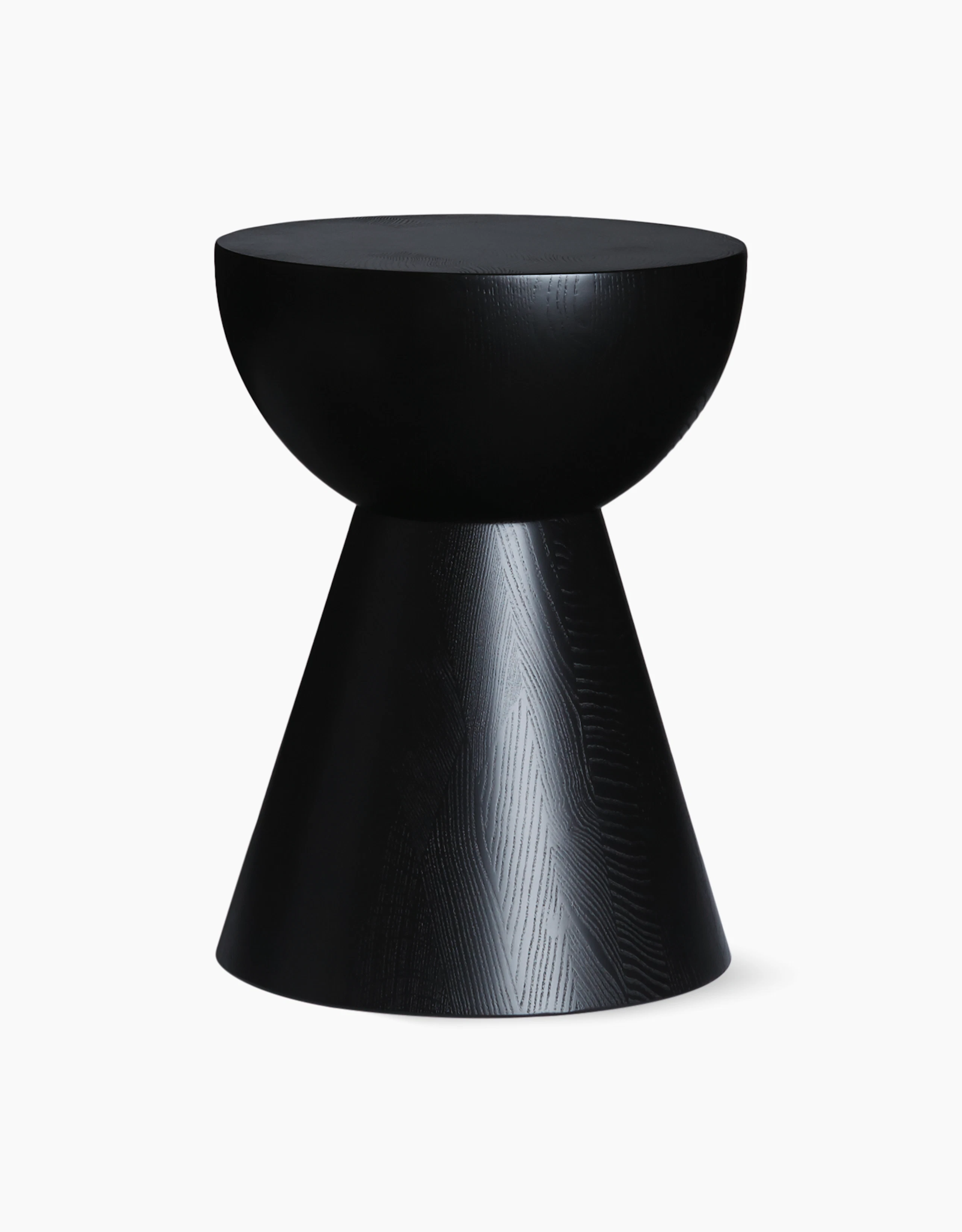 A Hew Side Table in a painted black finish.