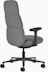 Rear angle view of a high-back Asari chair by Herman Miller in dark grey with height adjustable arms.