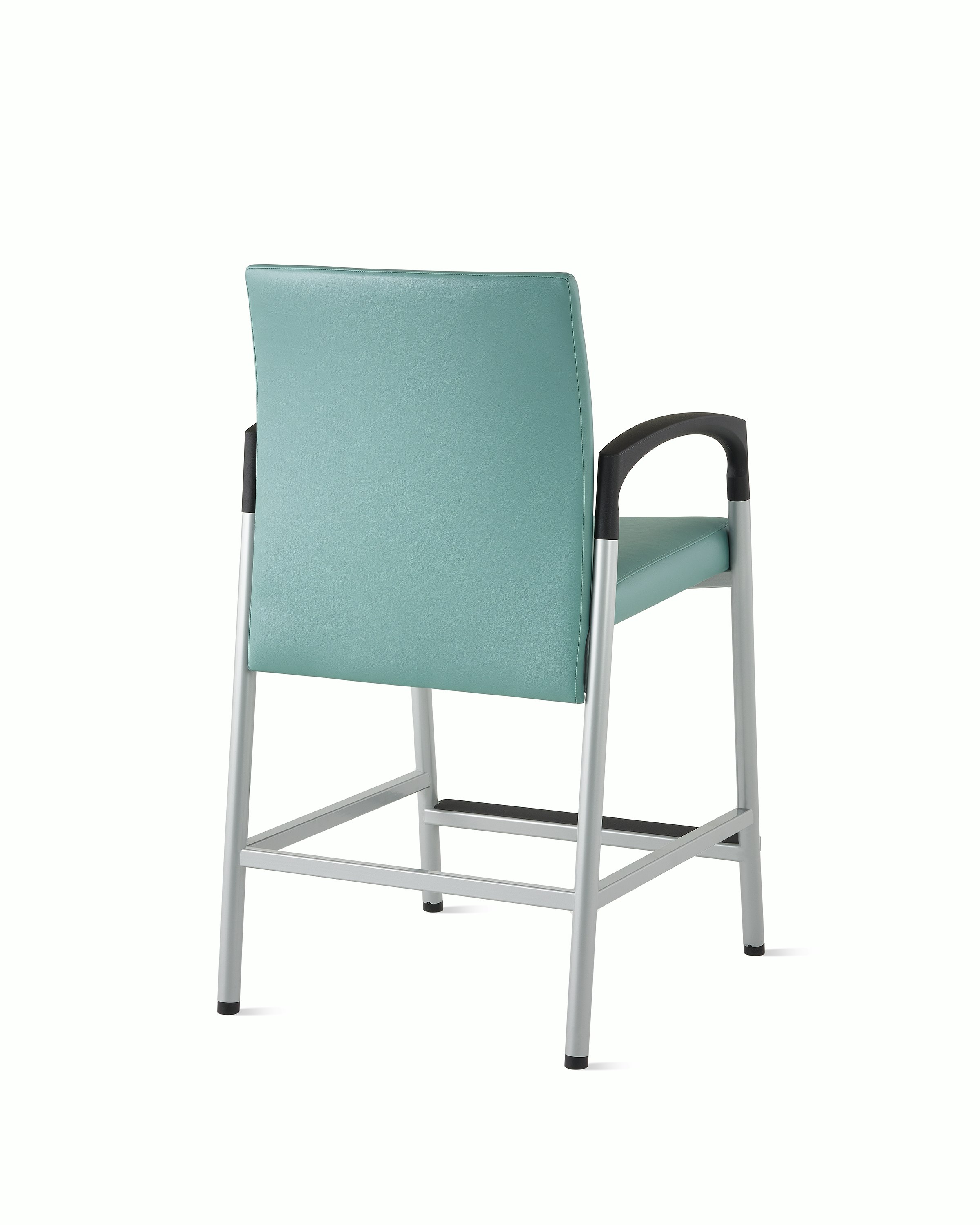 Three-quarter, back view of a Valor Easy Access chair in a blue-green upholstery with a silver frame and black armcaps on white sweep.