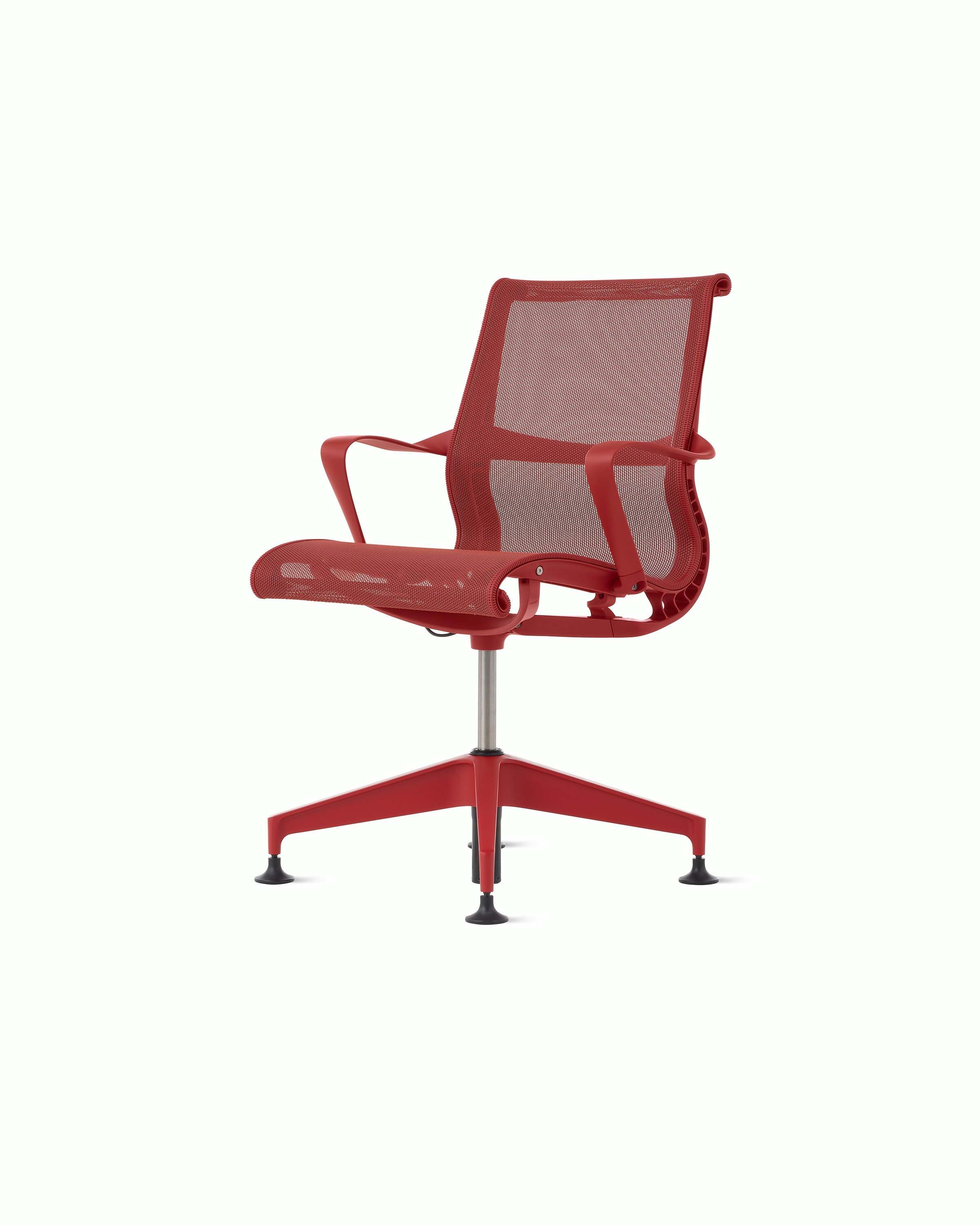 Front angle view of a Setu side chair with fixed arms in red.