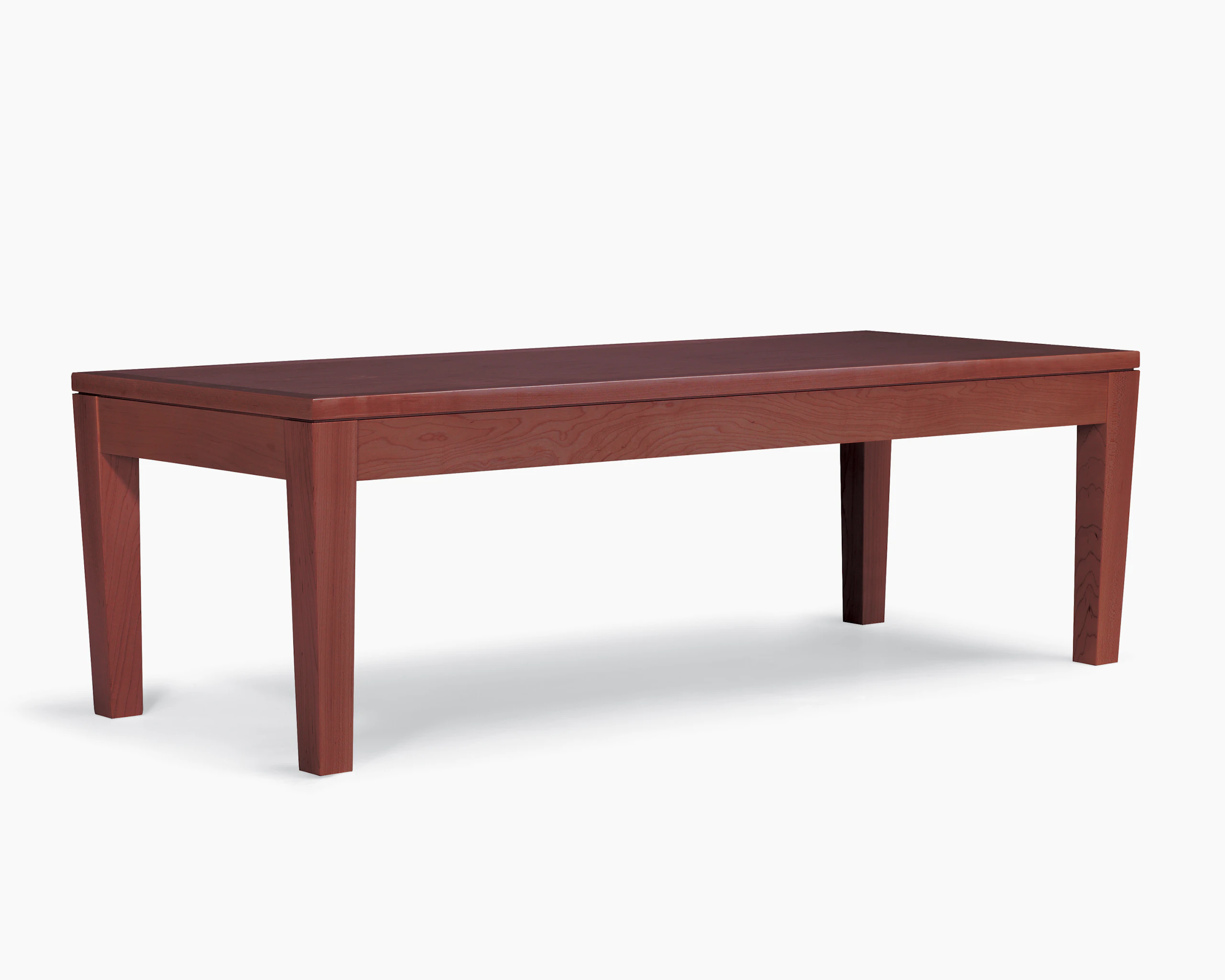 A Brava Table with a solid maple frame and veneer top in a red-toned finish.