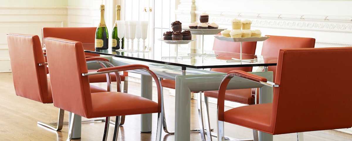 LC6 Table with celebratory champagne and cupcakes in a home setting