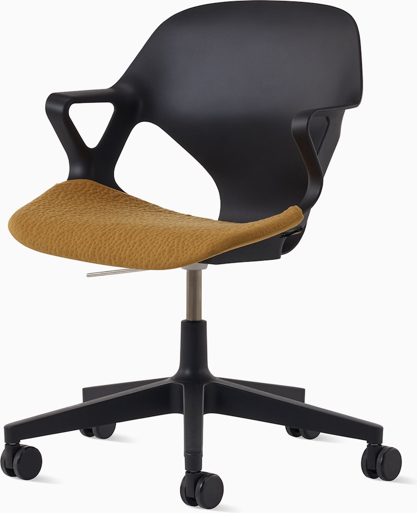 Front angle view of a black Zeph chair with fixed arms and a mustard yellow seat pad.