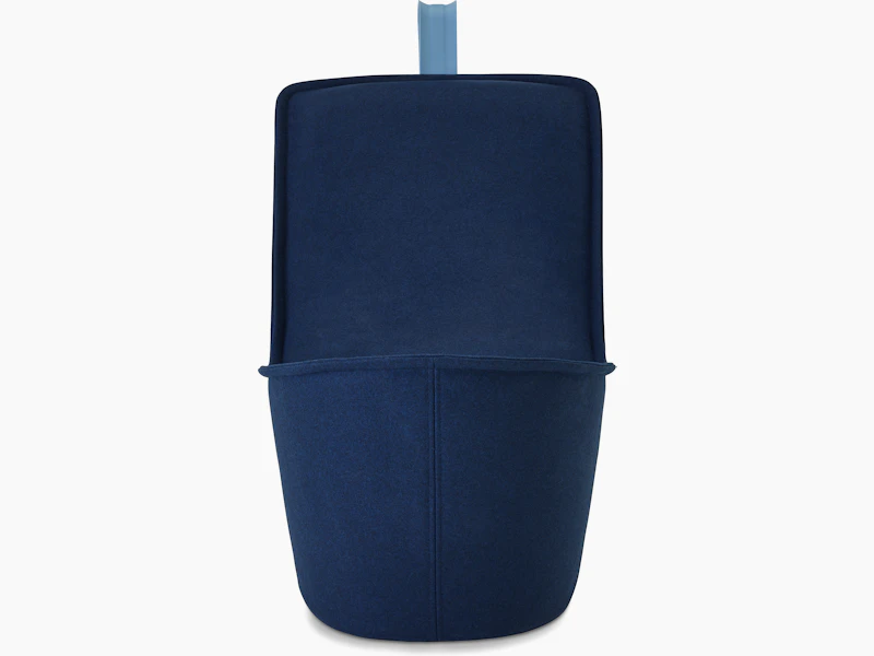A dark blue lounge chair with pastel blue handle.