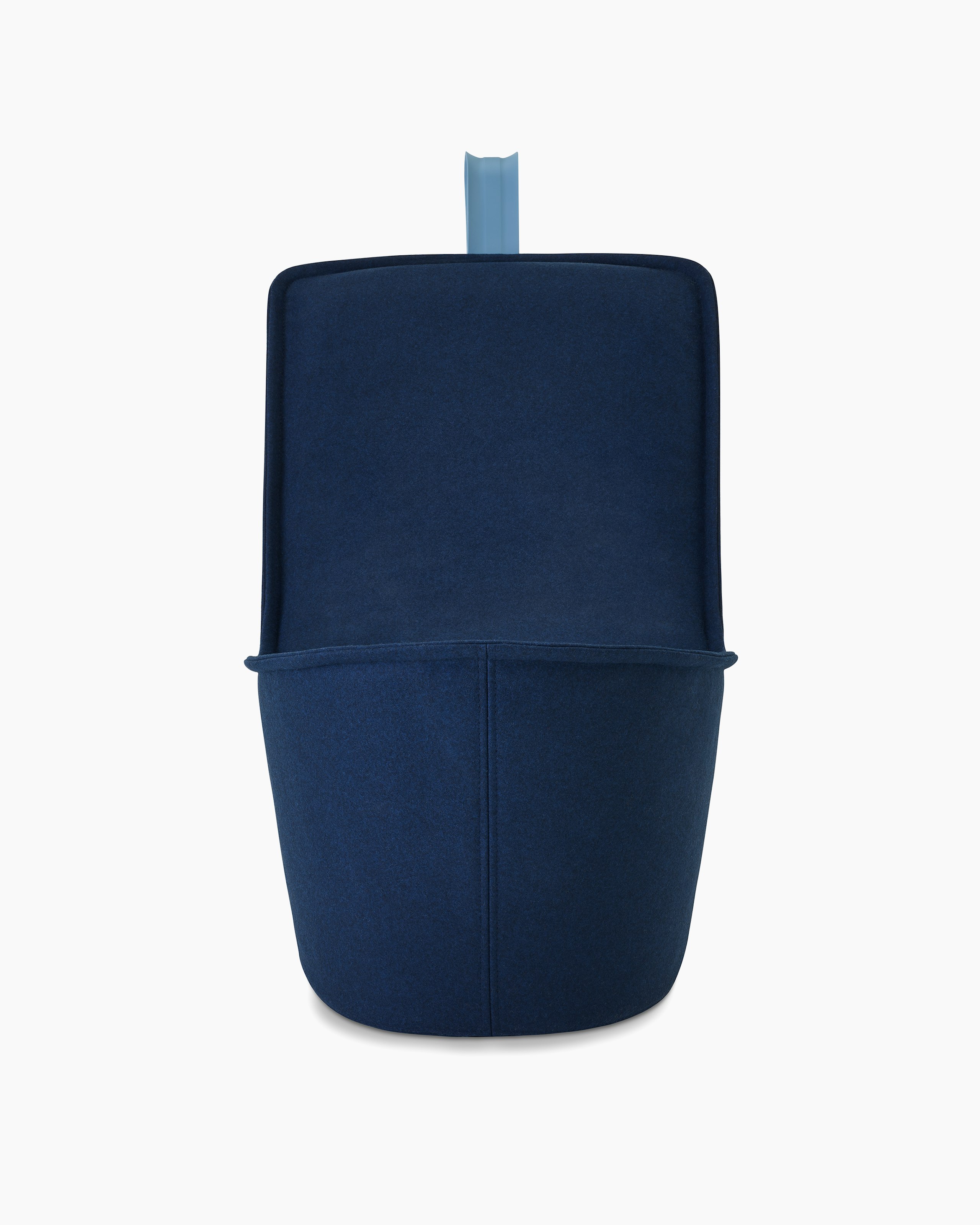 A dark blue lounge chair with pastel blue handle.