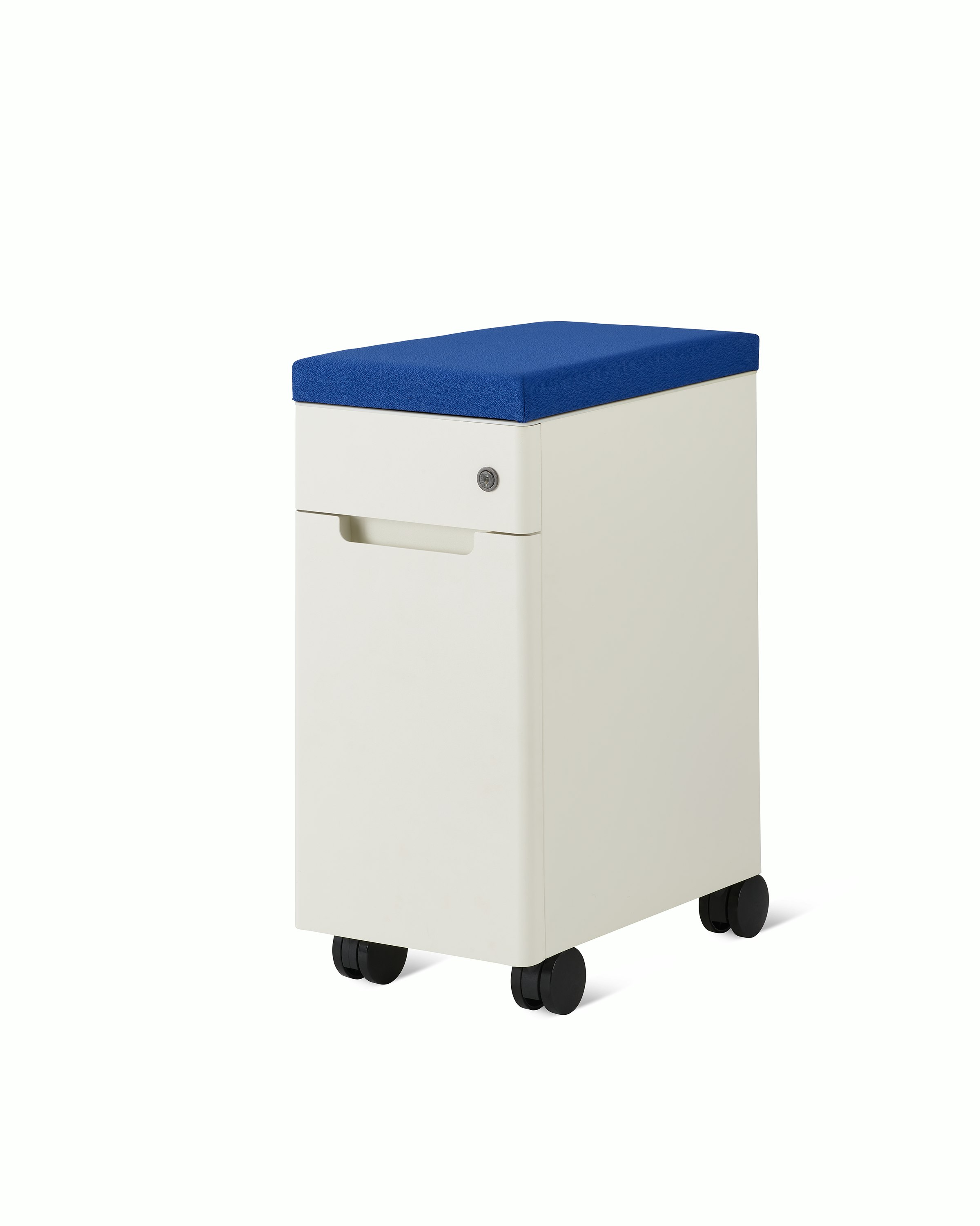 Slim, white storage pedestal on casters with a small drawer with lock, a clue cushion top, and door for storage.