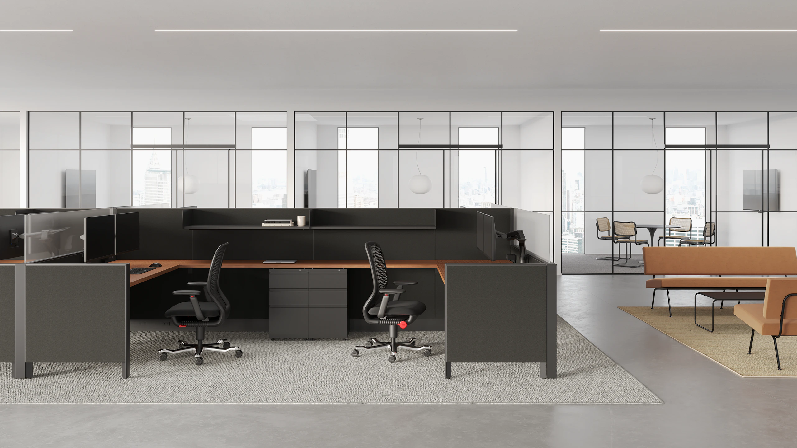 Dark grey Dividends Skyline workstations with black Newsom Task Chairs and dark grey Series 2 storage pedestals.