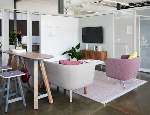 Rockwell Unscripted Team Meeting Lounge rockwell unscripted creative wall perforated steel pivot fins fixed fins enclosed rooms team meeting lounge tall table drink rail easy stools modular lounge sofa club chair occasional table coffee table credenza tv monitor markerboard muuto ply rug