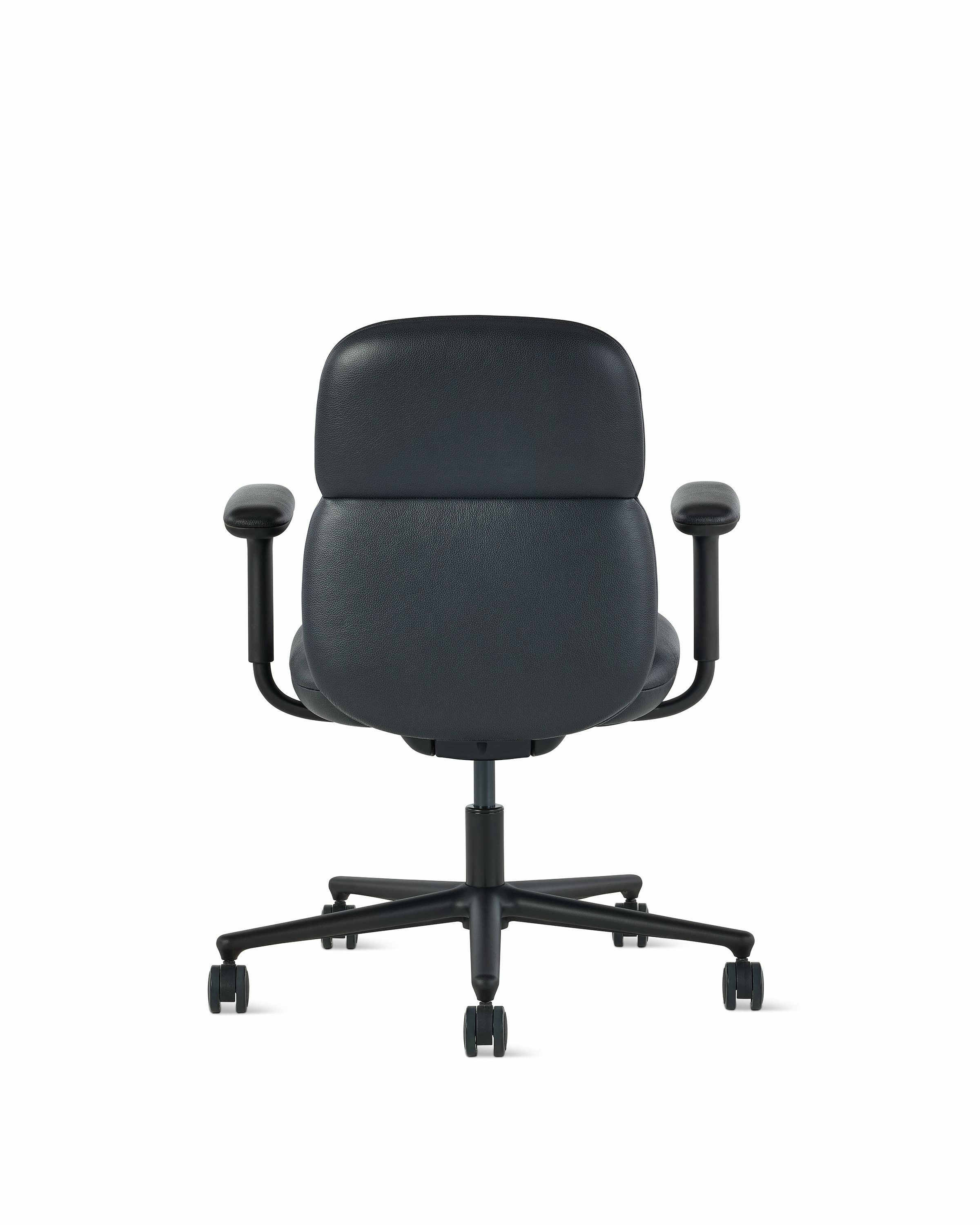 Rear view of a mid-back Asari chair by Herman Miller in black leather with height adjustable arms.