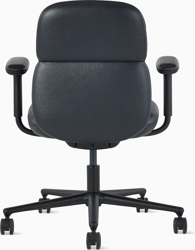 Rear view of a mid-back Asari chair by Herman Miller in black leather with height adjustable arms.
