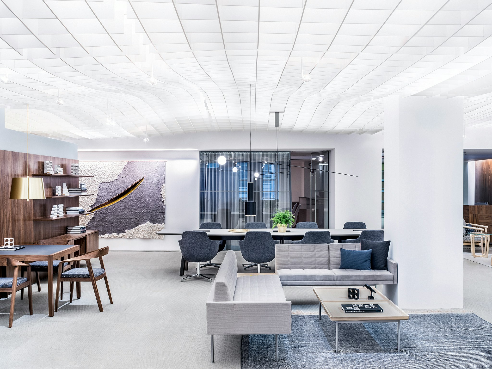 An office setting featuring a variety of meeting and lounge areas.