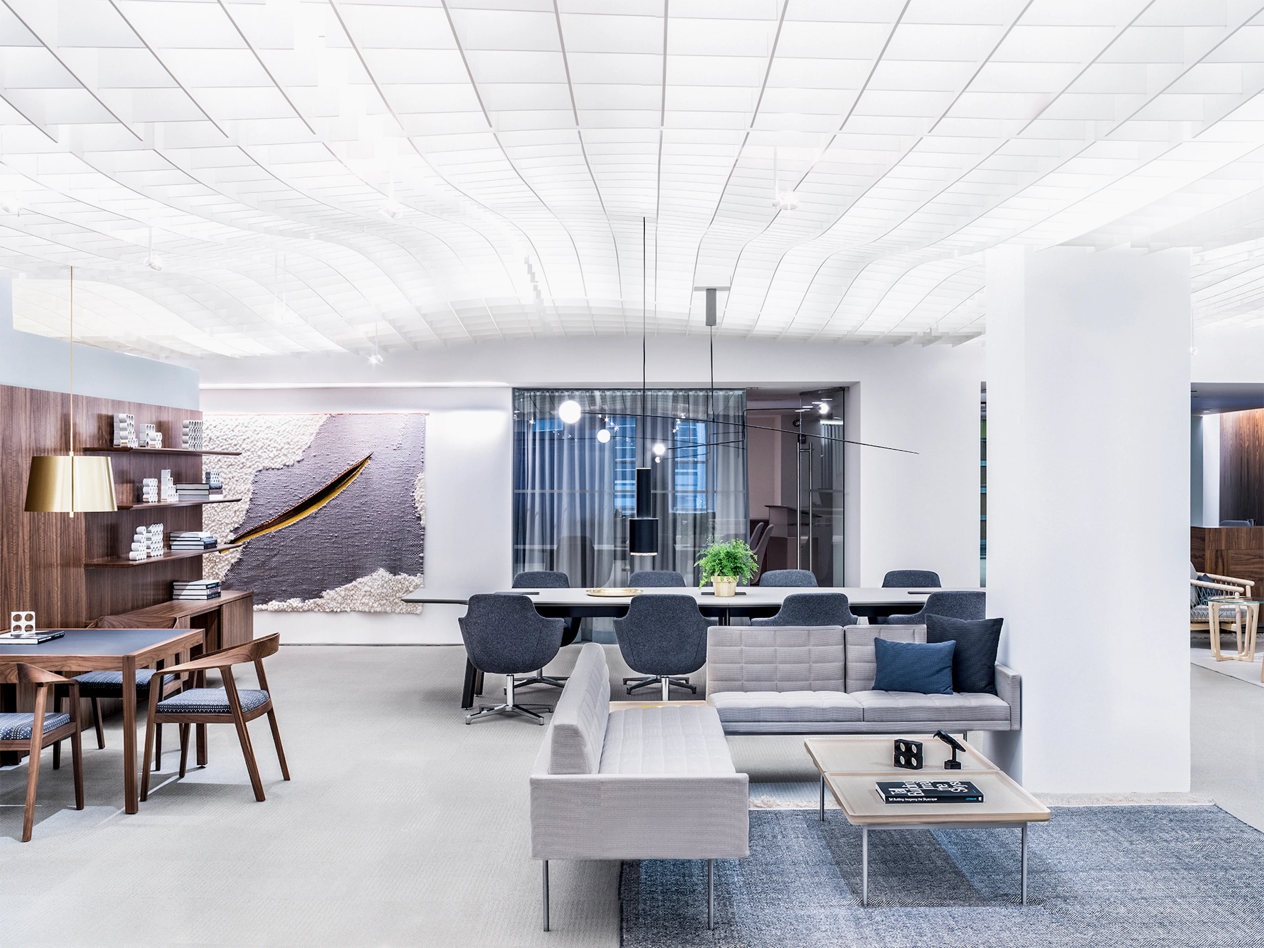 An office setting featuring a variety of meeting and lounge areas.