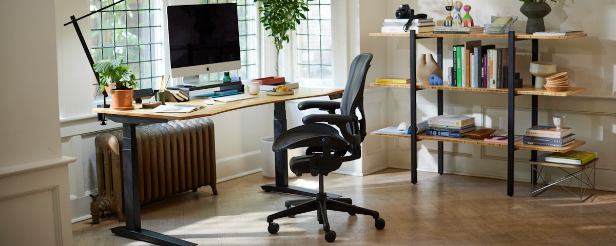HM X FULLY Aeron Chair and Jarvis Bamboo Desk in a home office setting