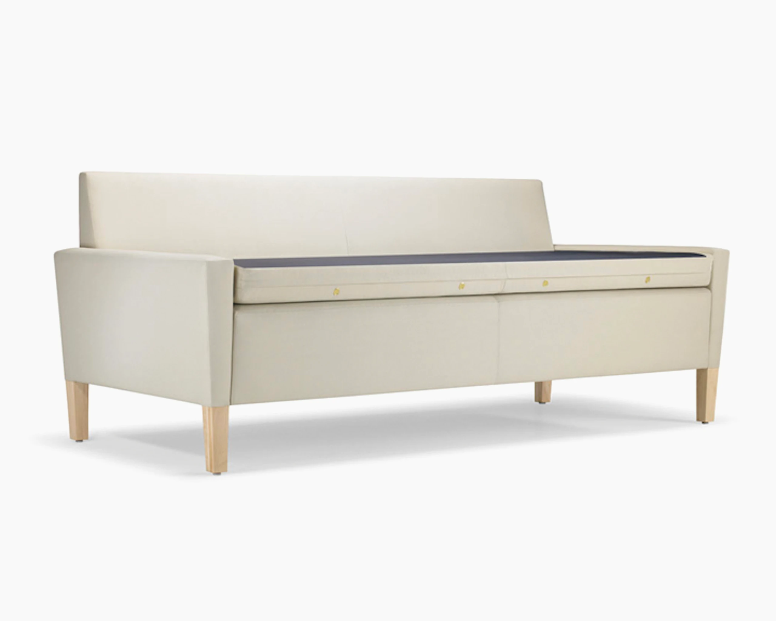 A Brava Flop Sofa in white textile with maple legs ready to unfold.