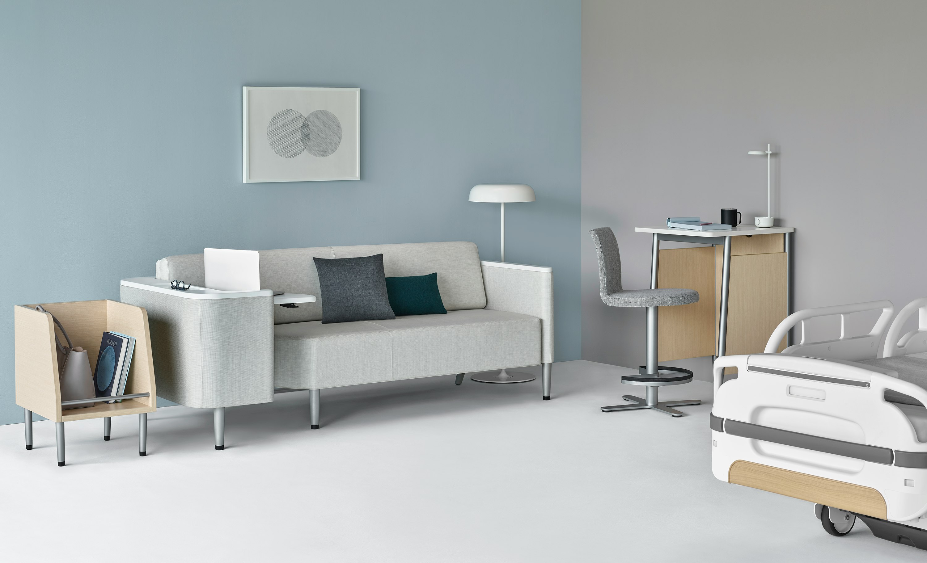 Patient room with a Nemschoff Palisade Flop Sofa, Nemschoff Palisade Tote, Nemschoff Palisade Stool, Nemschoff Palisade Daystande, and an Ode Lamp.