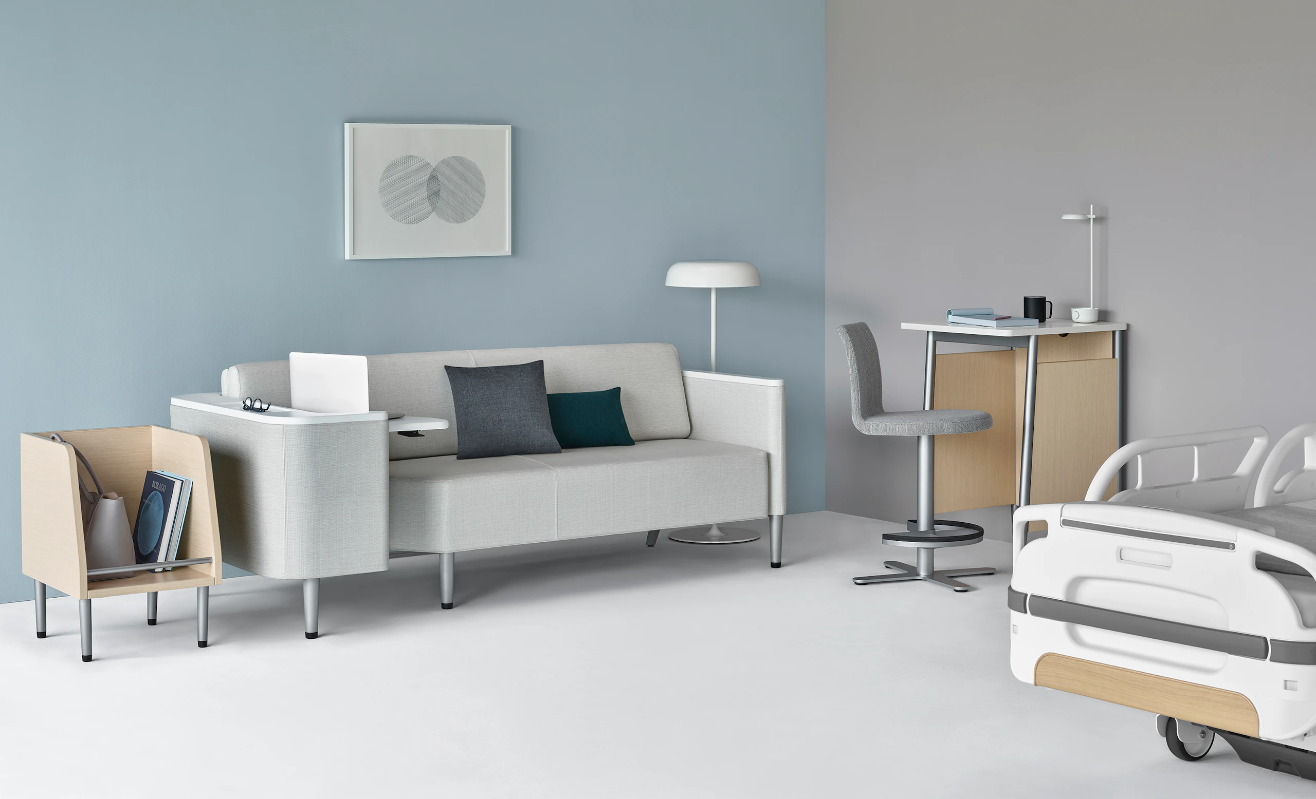 Patient room with a Nemschoff Palisade Flop Sofa, Nemschoff Palisade Tote, Nemschoff Palisade Stool, Nemschoff Palisade Daystande, and an Ode Lamp.