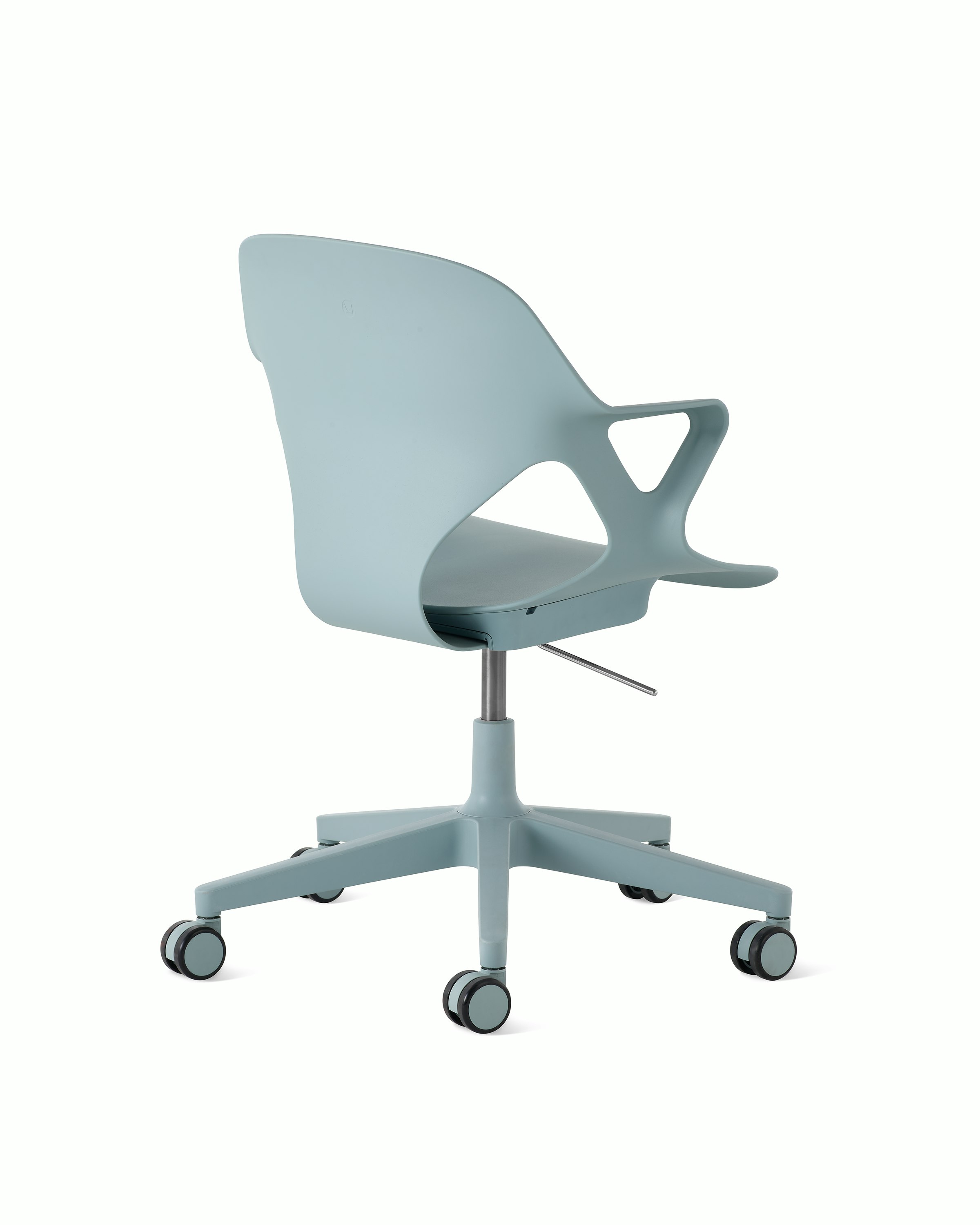 Rear angle view of a light blue Zeph chair with fixed arms.