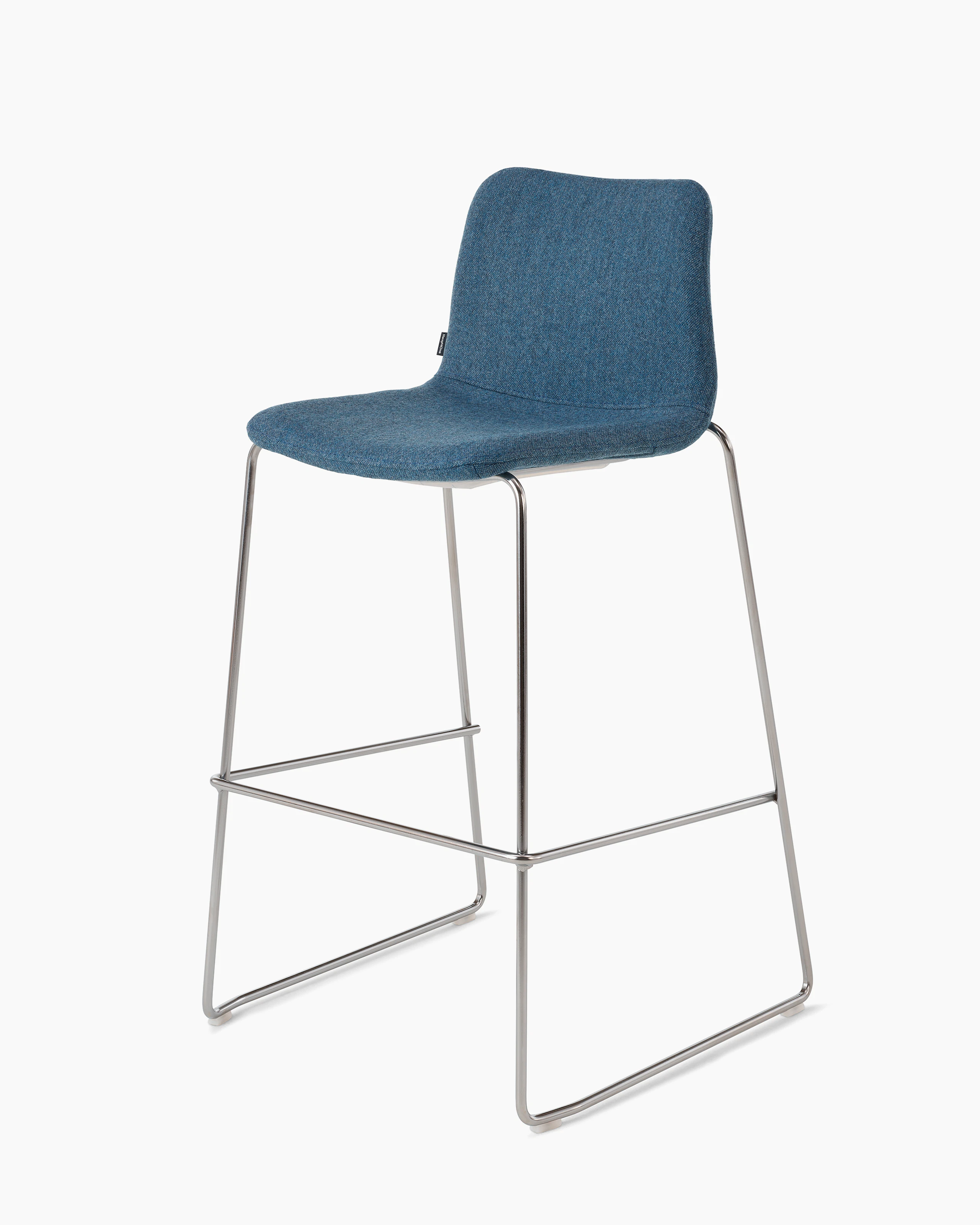 White sweep of Viv stool with blue fabric and polished aluminium sled base