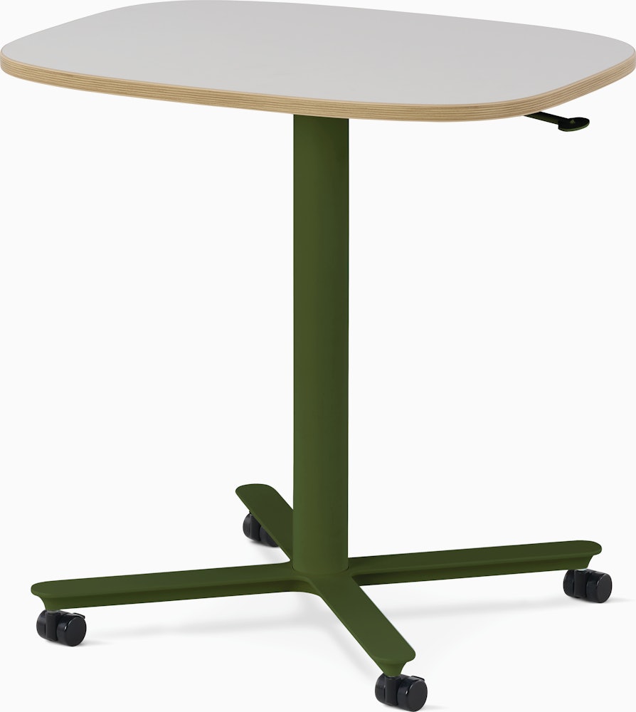 Large Passport Work Table with white surface, plywood edge and green base on casters.