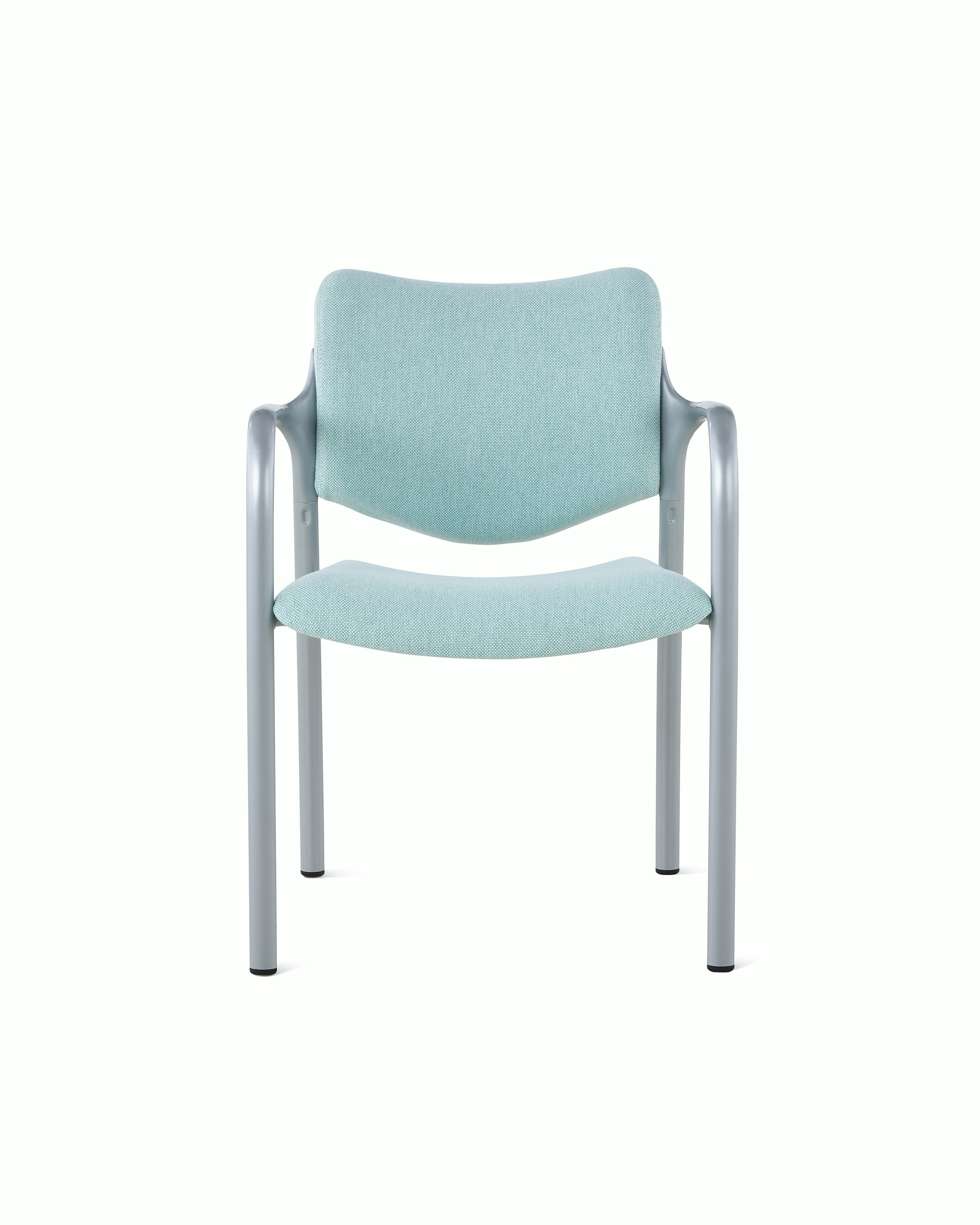 An Aside Chair with light green upholstered seat and back, viewed from the front.