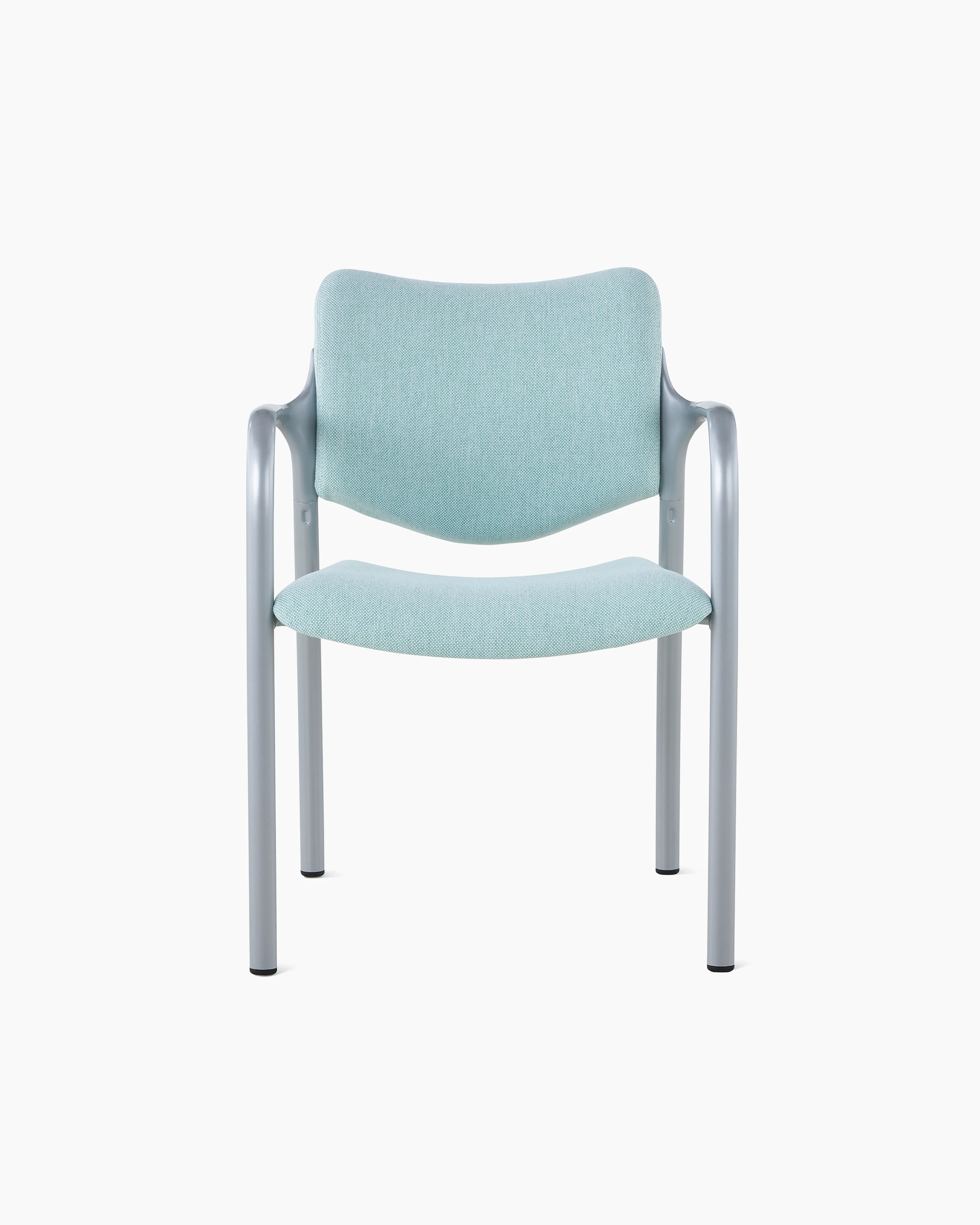 An Aside Chair with light green upholstered seat and back, viewed from the front.
