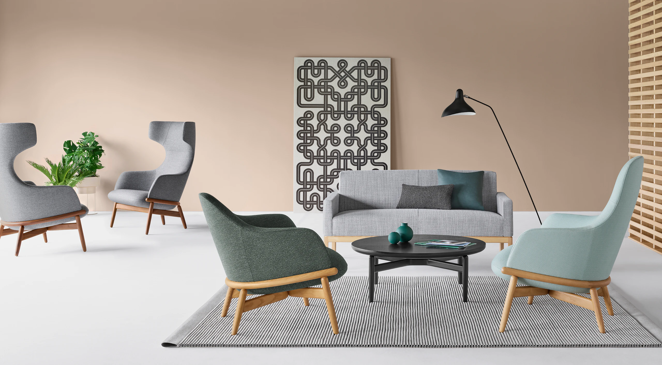 An office lounge environment featuring Reframe Lounge Seating.