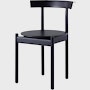 A black Comma Chair, viewed from front at an angle.