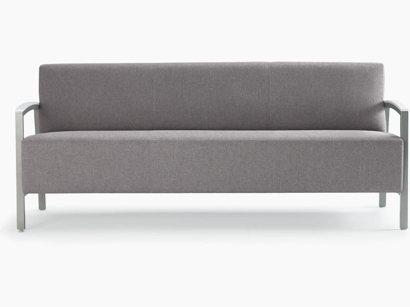 Front view of a gray Brava Modern Lounge Seating sofa with solid surface arm caps.